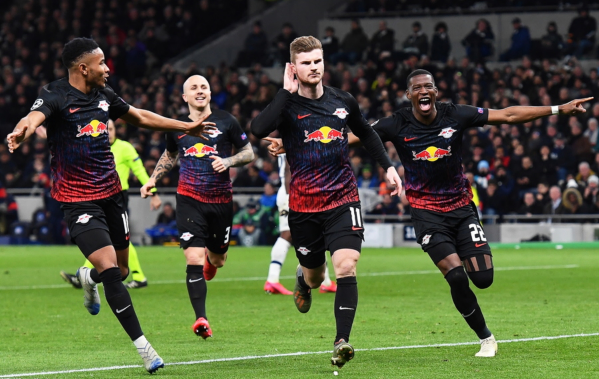 epa08229244 Timo Werner (C) of Leipzig celebrates with teammates after scoring the 1-0 lead from the penalty spot during the UEFA Champions League round of 16, first leg soccer match between Tottenham Hotspur and RB Leipzig in London, Britain, 19 February 2020.  EPA