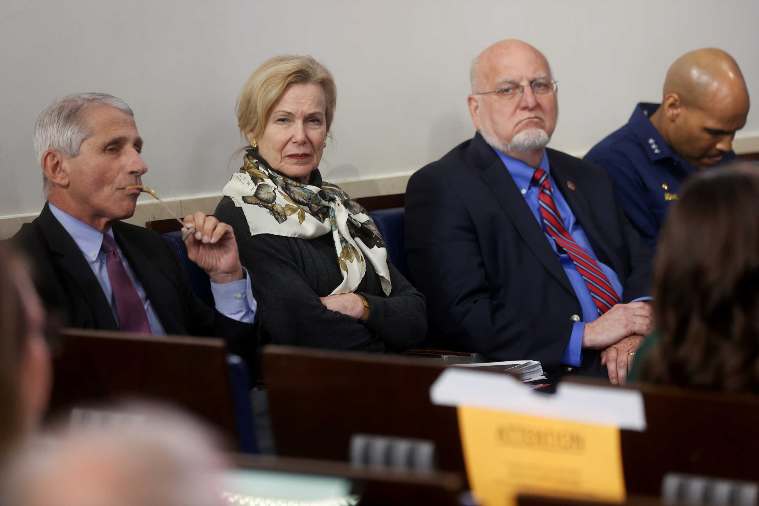White House medical advisors, including Dr. Anthony Fauci of the National Institutes of Health, White House coronavirus coordinator Dr. Deborah Birx, Centers for Disease Control (CDC) Director Robert Redfield and U.S. Surgeon General Jerome Adams listen to the daily coronavirus task force briefing with President Donald Trump at the White House in Washington, U.S., April 22, 2020. REUTERS