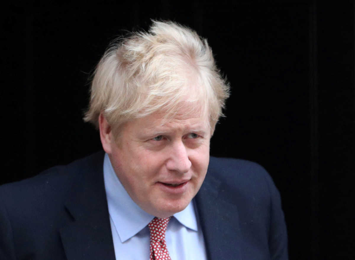 FILE PHOTO: Britain's Prime Minister Boris Johnson leaves Downing Street, as the spread of coronavirus disease (COVID-19) continues. London, Britain, March 25, 2020. REUTERS