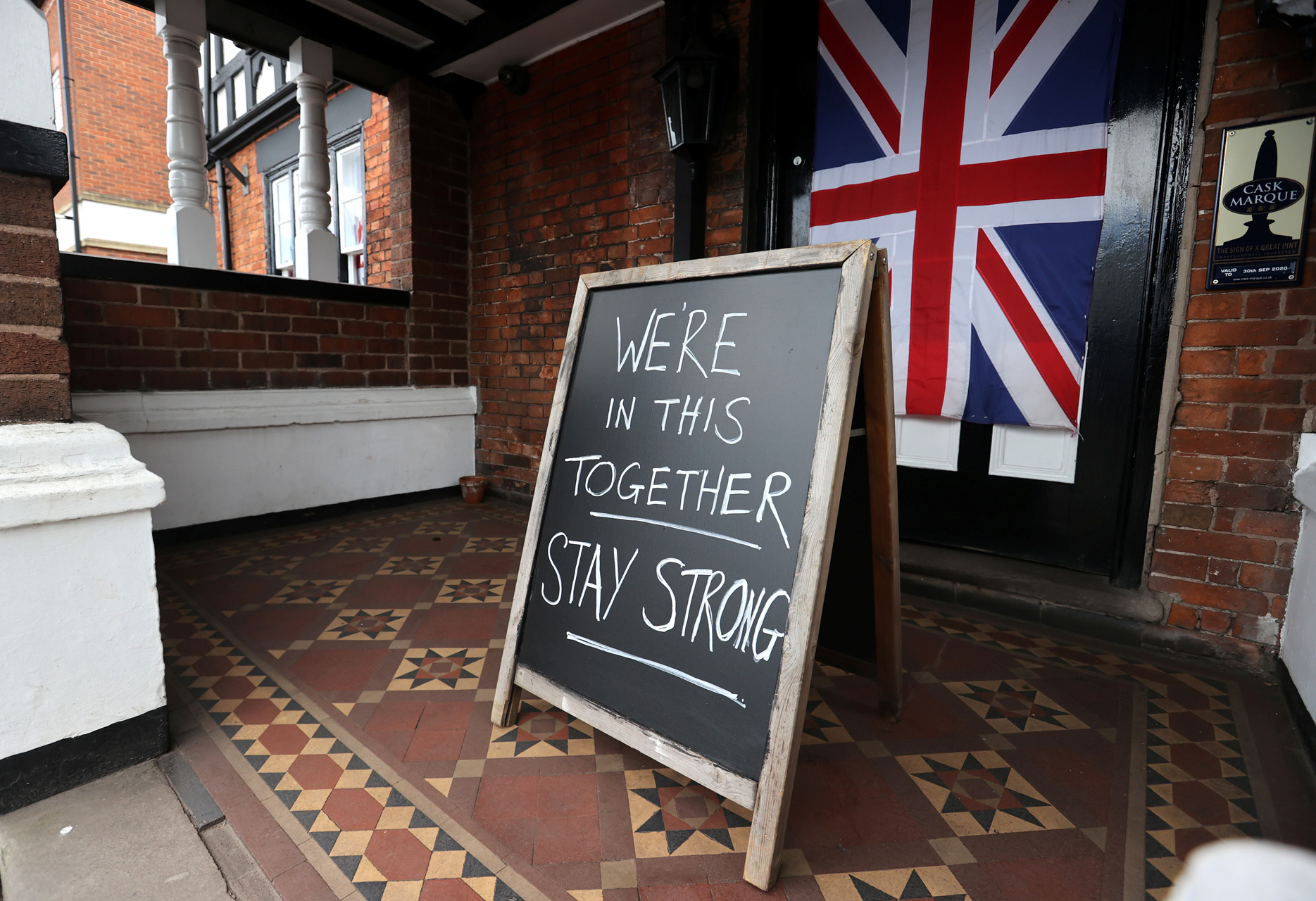 A sign is seen outside a pub in Eccleshall as the spread of the coronavirus disease (COVID-19) continues, Eccleshall, Britain, April 6, 2020. REUTERS