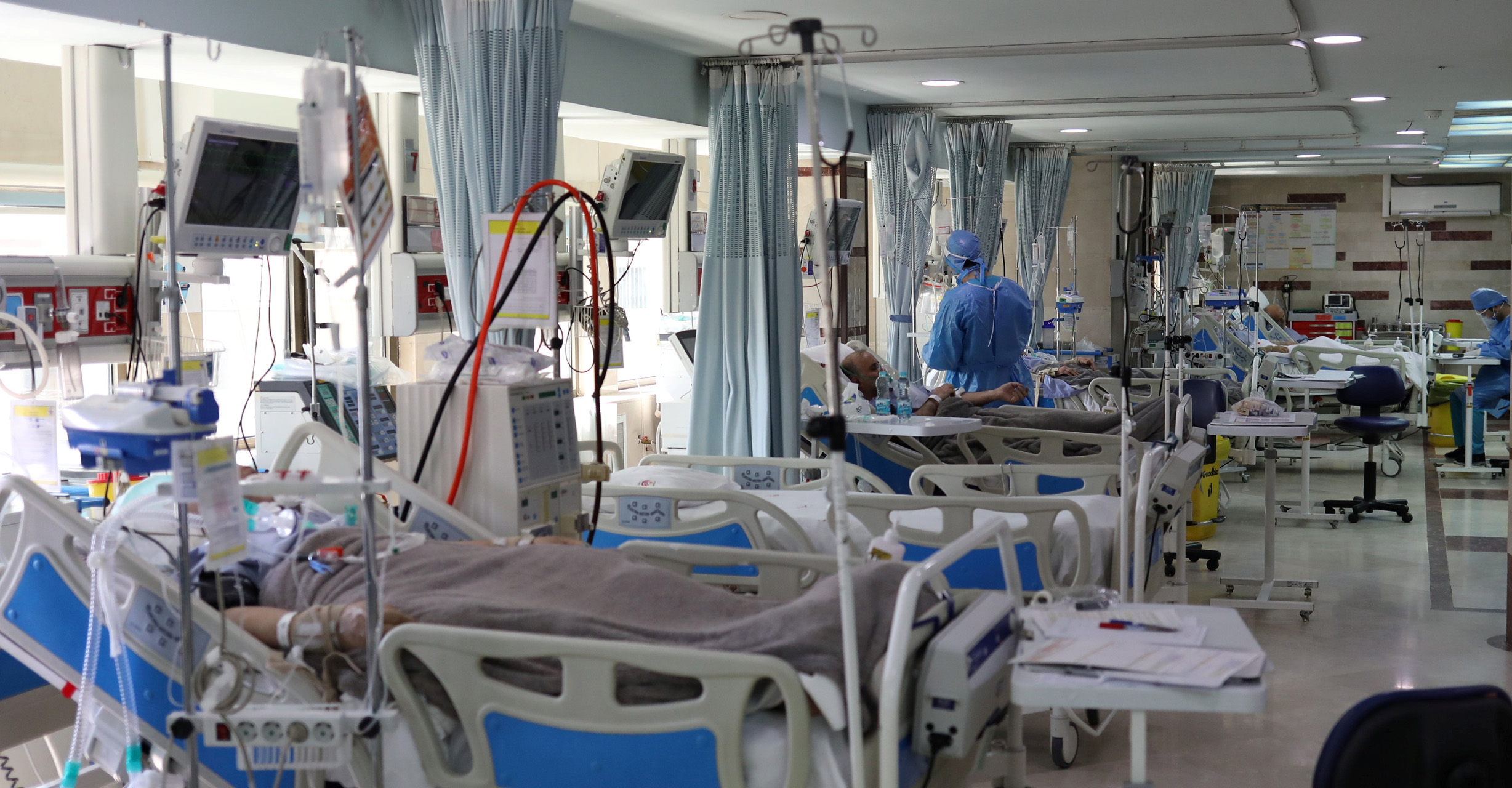 Patients with coronavirus disease (COVID-19) lie in beds at the ICU of Sasan Hospital, in Tehran, Iran March 30, 2020. WANA (West Asia News Agency)