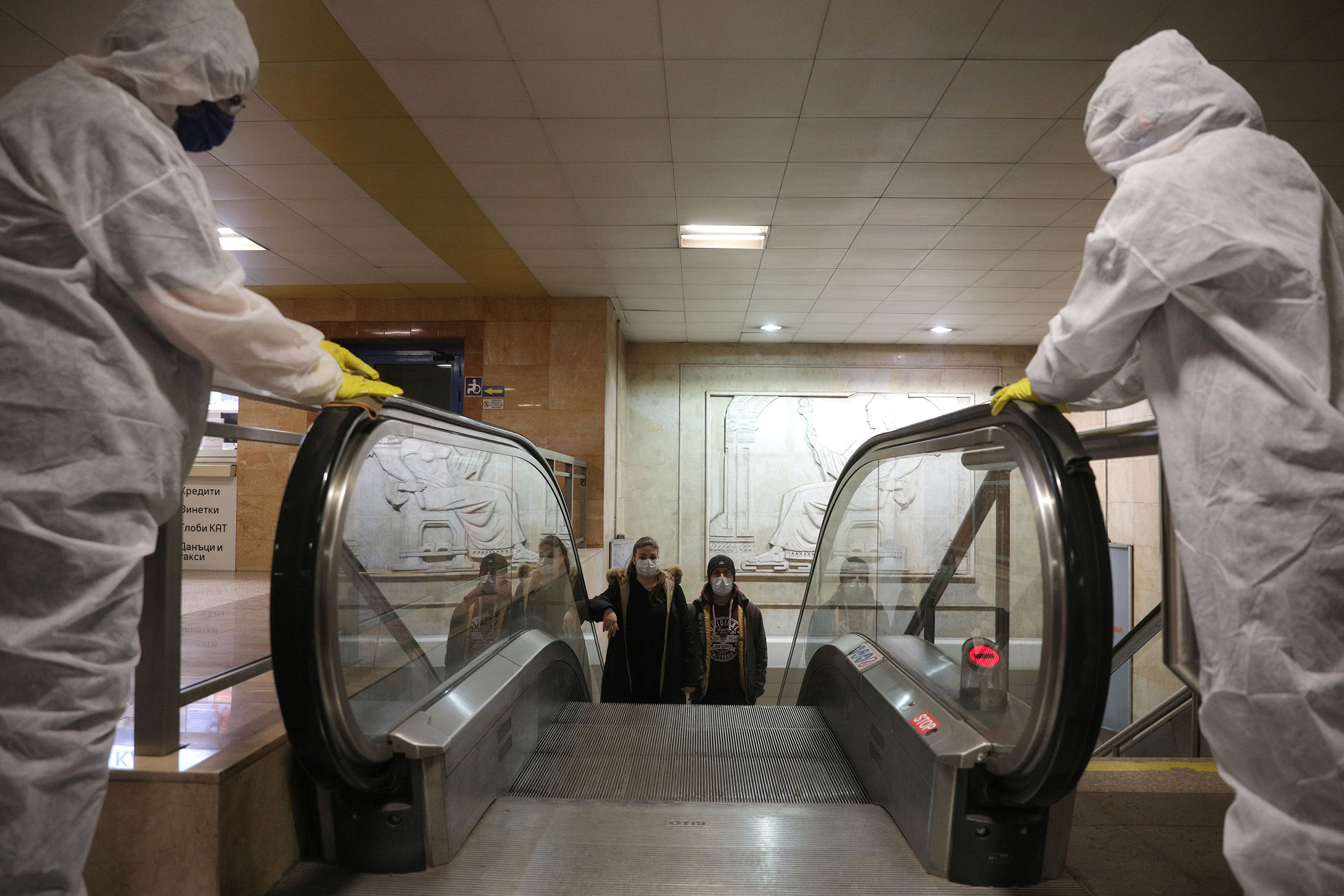 Workers disinfect an escalator in Serdika metro station, following the outbreak of the coronavirus disease (COVID-19), Sofia, Bulgaria, April 8, 2020.  REUTERS