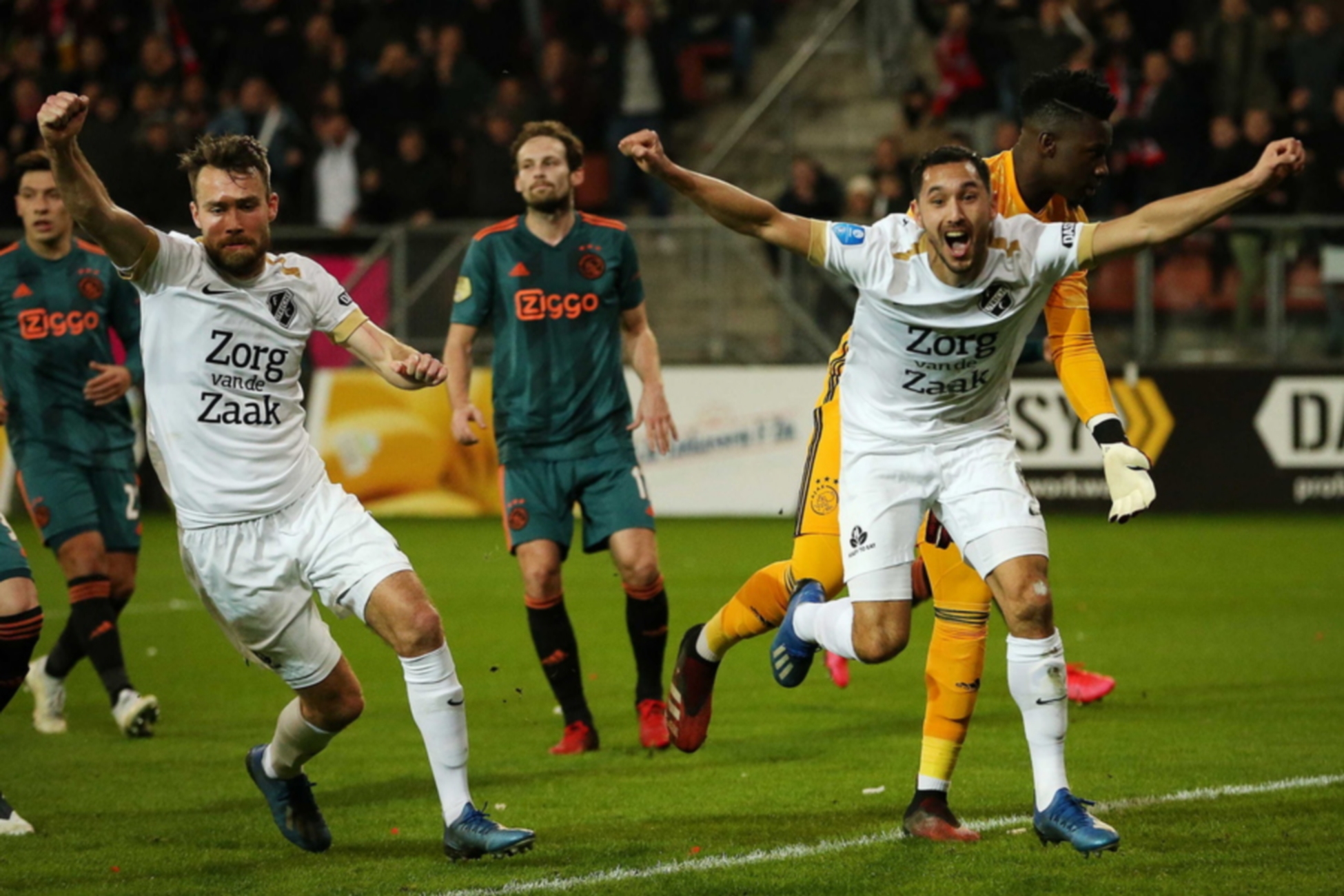 epa08270343 Sander van de Streek (L) of FC Utrecht celebrates after scoring during the Dutch Cup KNVB Cup semifinal soccer match between Utrecht and Ajax in Utrecht, the Netherlands, 04 March 2020.  EPA