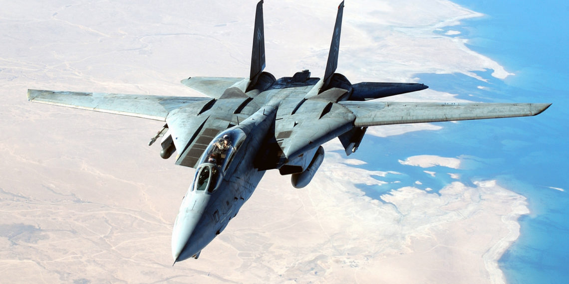 A US Navy (USN) F-14D Tomcat aircraft flies a combat mission in support of Operation IRAQI FREEDOM.