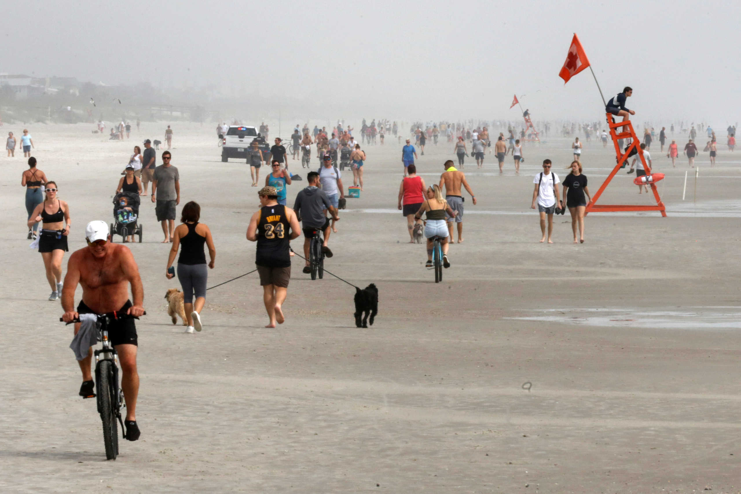 People take advantage of a Duval County beach opening for physical activity amid coronavirus disease (COVID-19) restrictions in Jacksonville, Florida, U.S. April 19, 2020. REUTERS