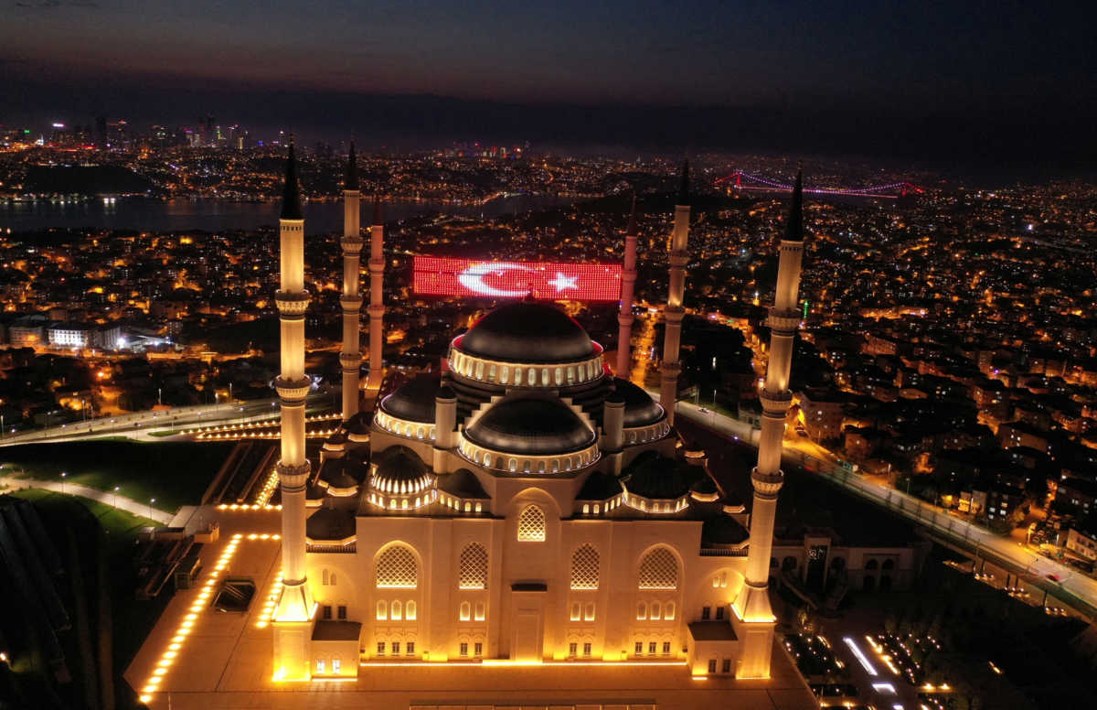 Mahya depicts Turkey's national flag which is installed between the minarets of Camlica mosque, as the outbreak of the coronavirus disease (COVID-19) continues in Istanbul, Turkey, April 28, 2020. Picture taken with a drone. REUTERS