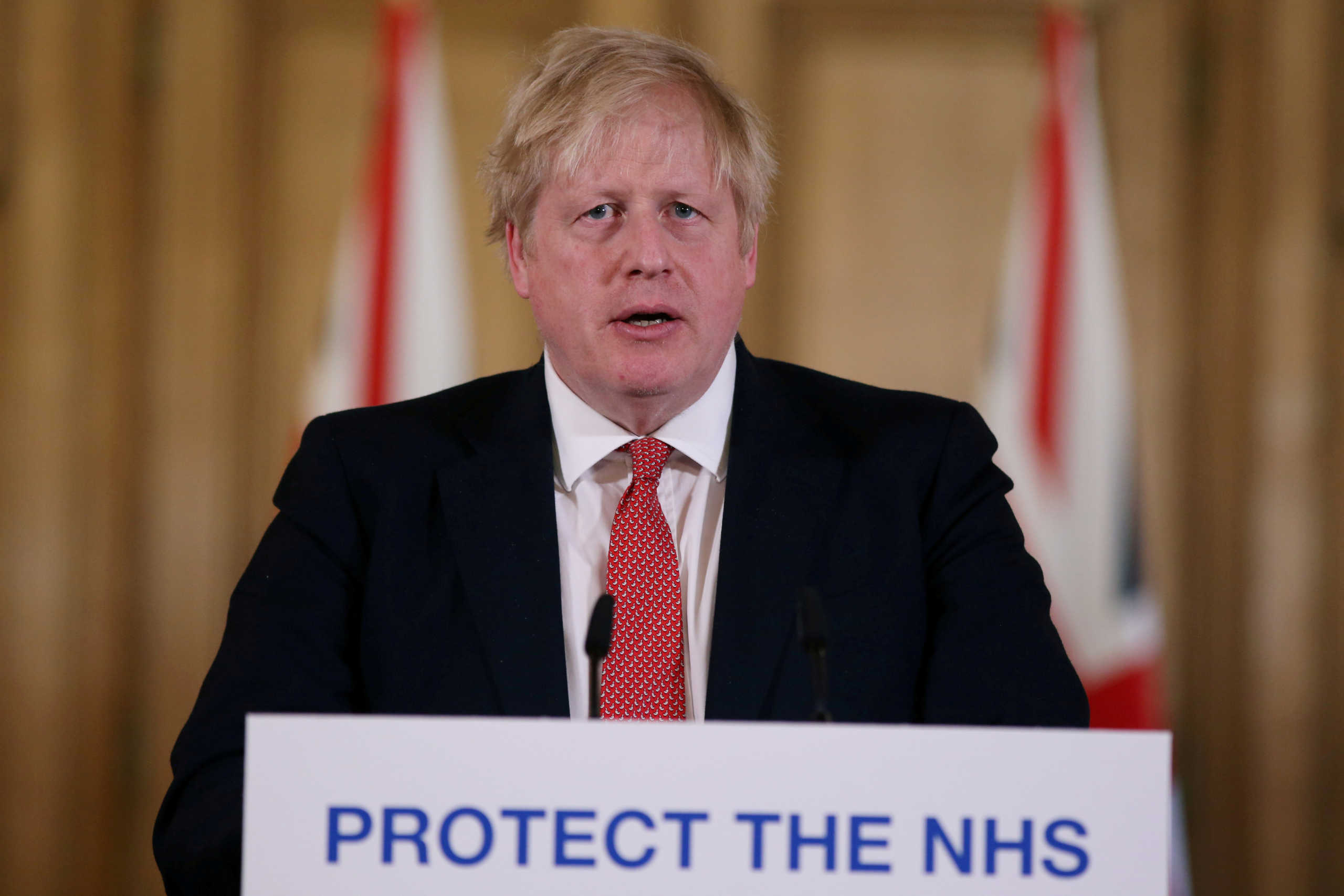 FILE PHOTO: Prime Minister Boris Johnson speaks during a news conference on the ongoing situation with the coronavirus disease (COVID-19) in London, Britain March 22, 2020.  Ian Vogler