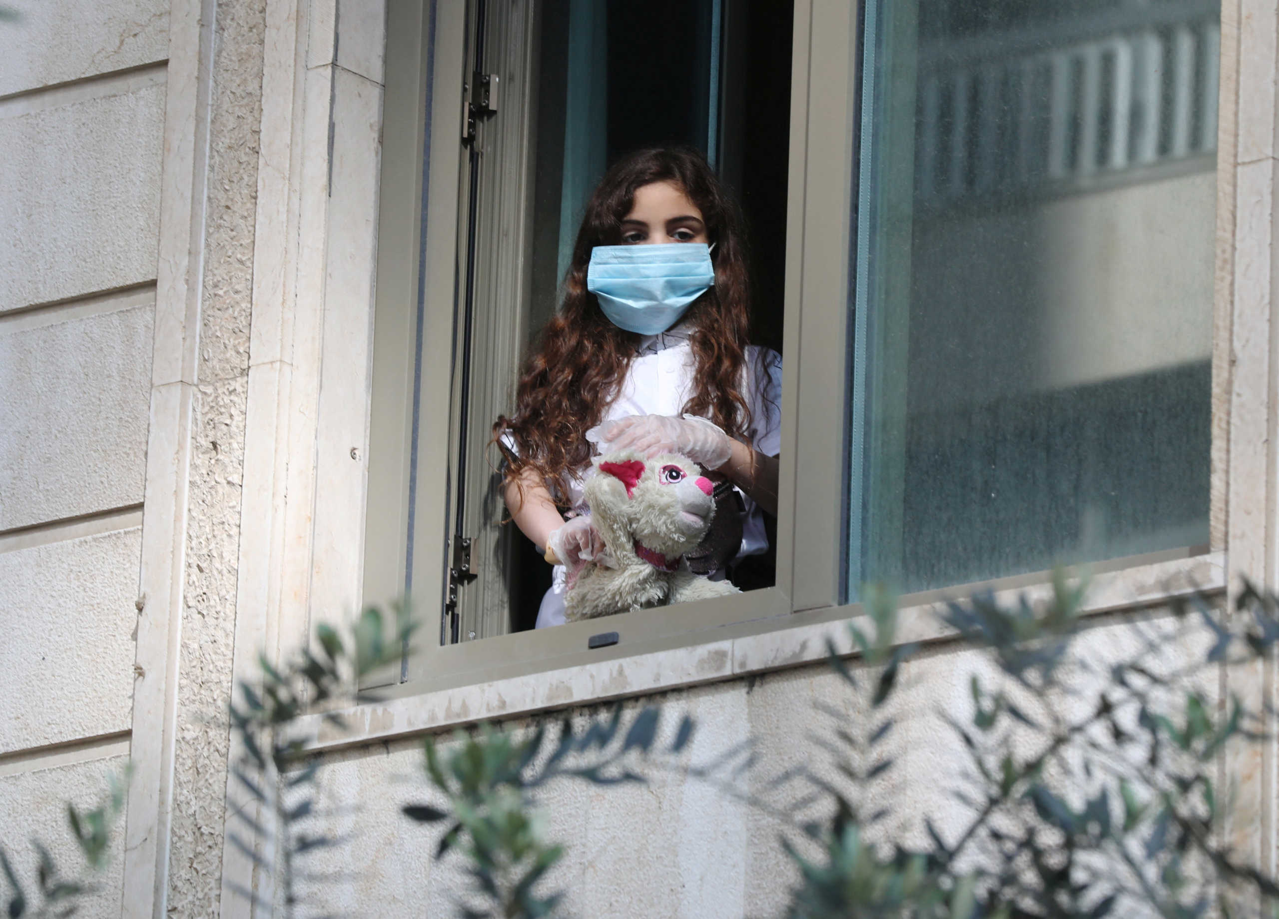 A Lebanese girl, who was stranded abroad by coronavirus lockdowns is quarantined at a hotel while awaiting results for the coronavirus disease (COVID-19) in Beirut, Lebanon, April 8, 2020. REUTERS