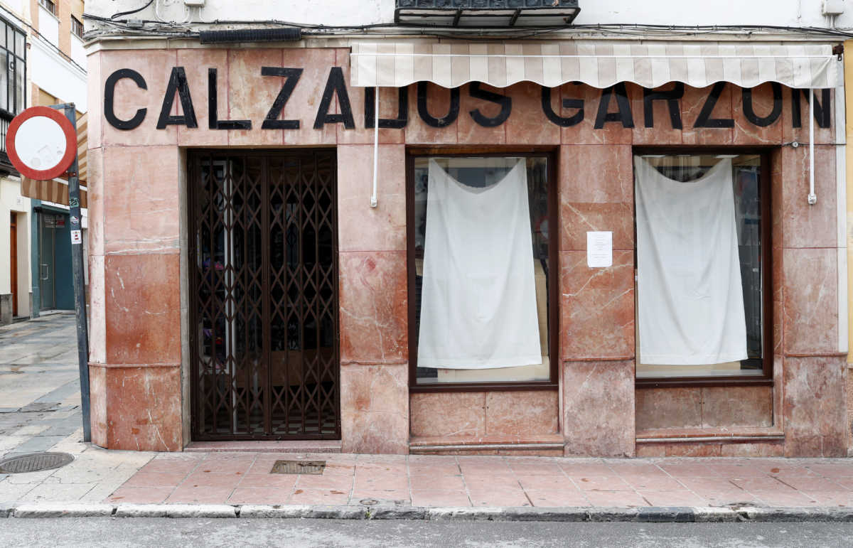 A shoe shop is closed amid the coronavirus disease (COVID-19) outbreak in Ronda, southern Spain, April 2, 2020. REUTERS