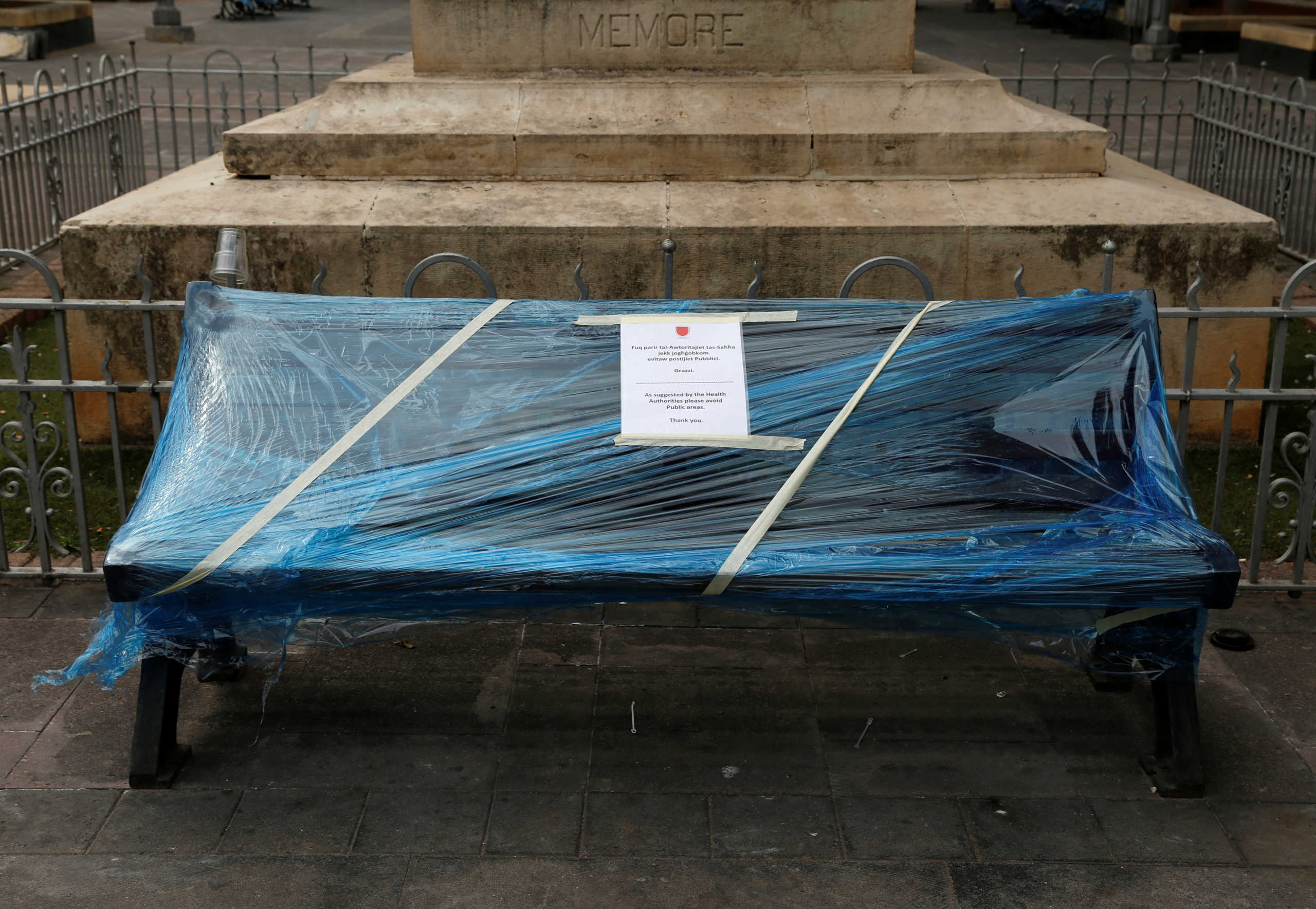 A bench wrapped in shrink wrap to discourage people from gathering in groups because of coronavirus disease (COVID-19) outbreak, is seen in Hamrun, Malta April 2, 2020. REUTERS