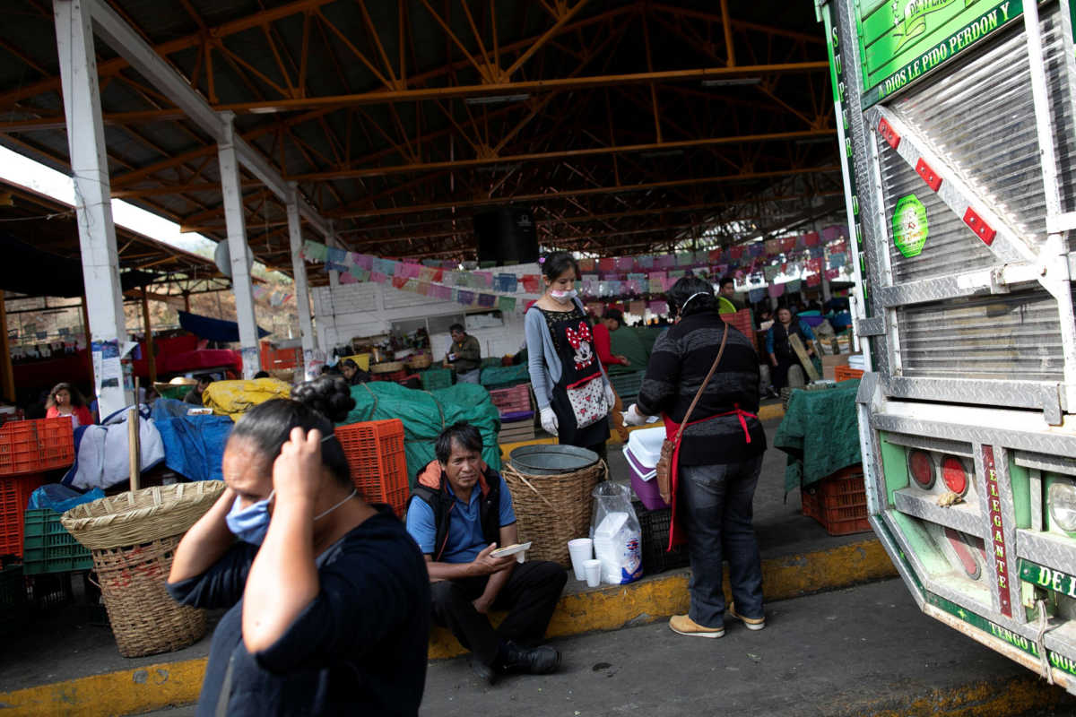 Local vendors work at the local market as the spread of the coronavirus disease (COVID-19) continues, at Milpa Alta municipality in Mexico City, Mexico April 17, 2020. Picture taken April 17, 2020. REUTERS