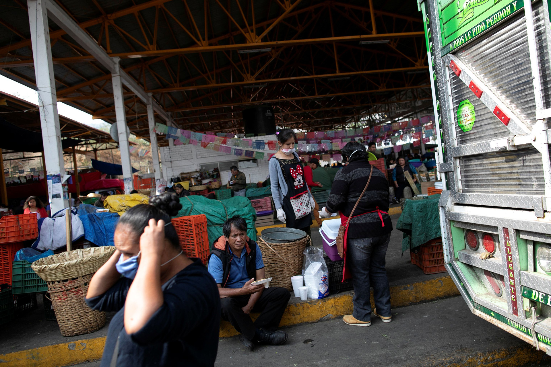 Local vendors work at the local market as the spread of the coronavirus disease (COVID-19) continues, at Milpa Alta municipality in Mexico City, Mexico April 17, 2020. Picture taken April 17, 2020. REUTERS