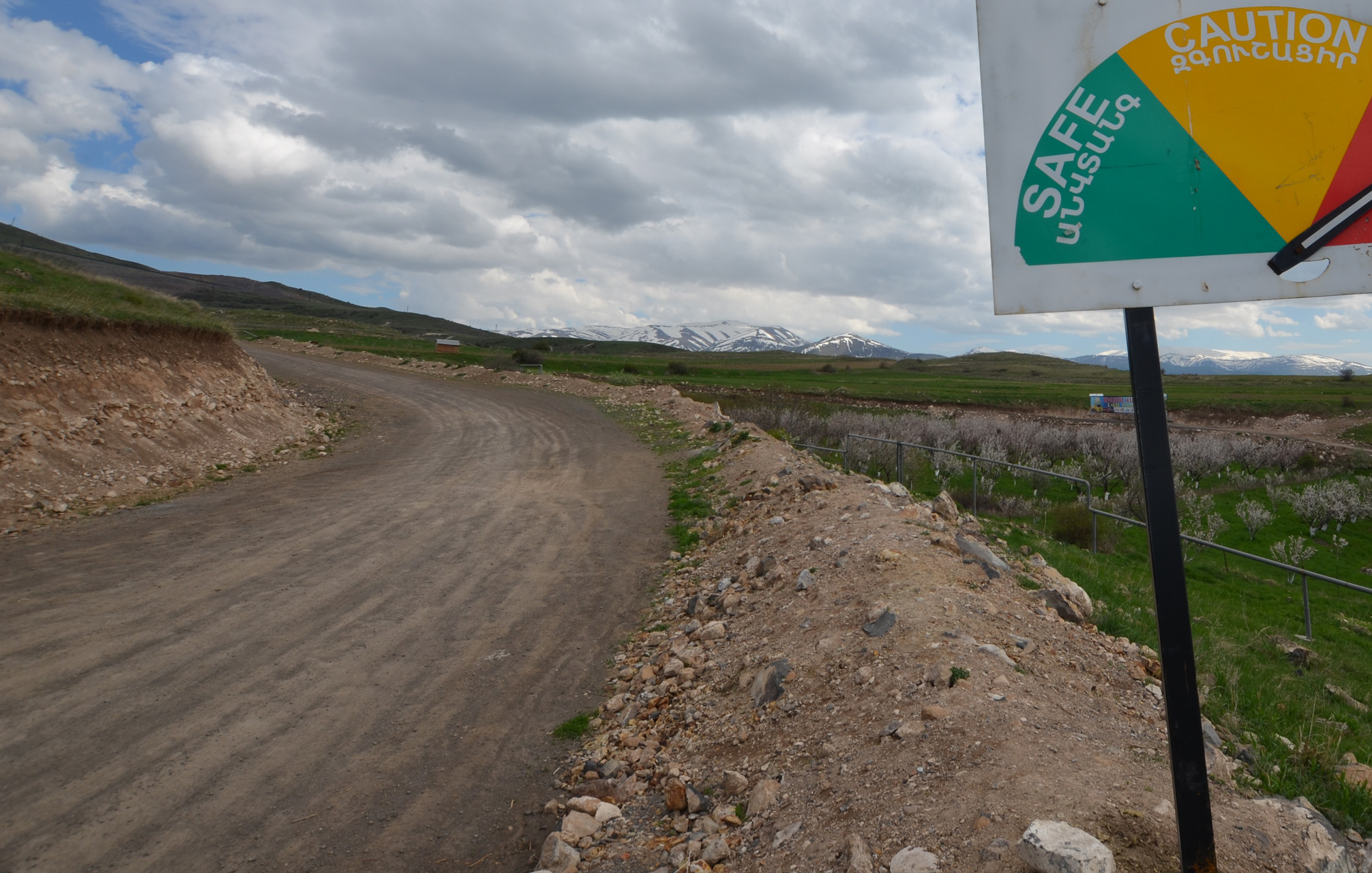 A sign is seen at a checkpoint manned by protesters blockading a gold mine near Gndevaz, Armenia. May 13, 2019. Thomson Reuters Foundation