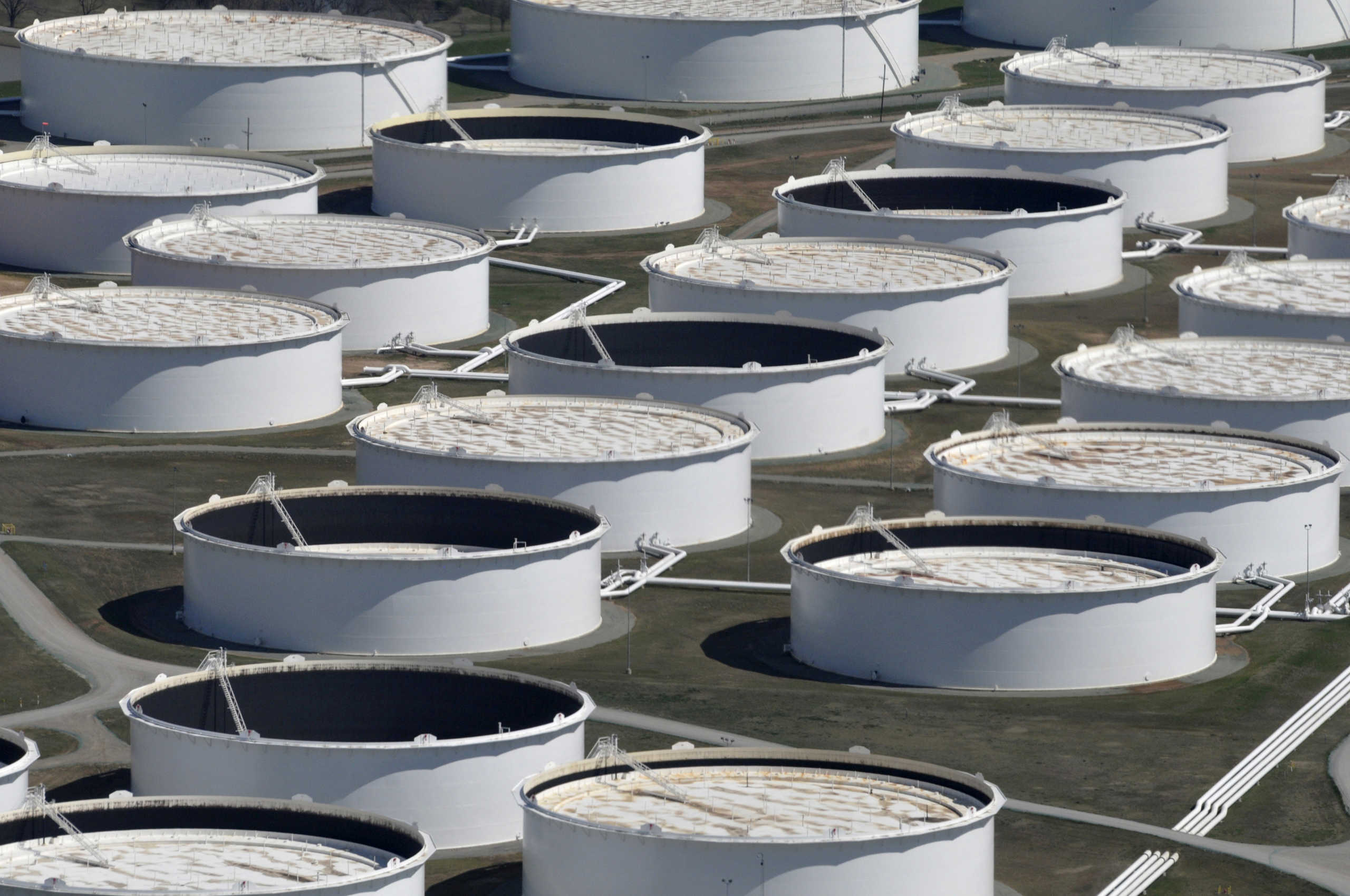 FILE PHOTO: Crude oil storage tanks are seen from above at the Cushing oil hub,  Oklahoma, March 24, 2016. REUTERS