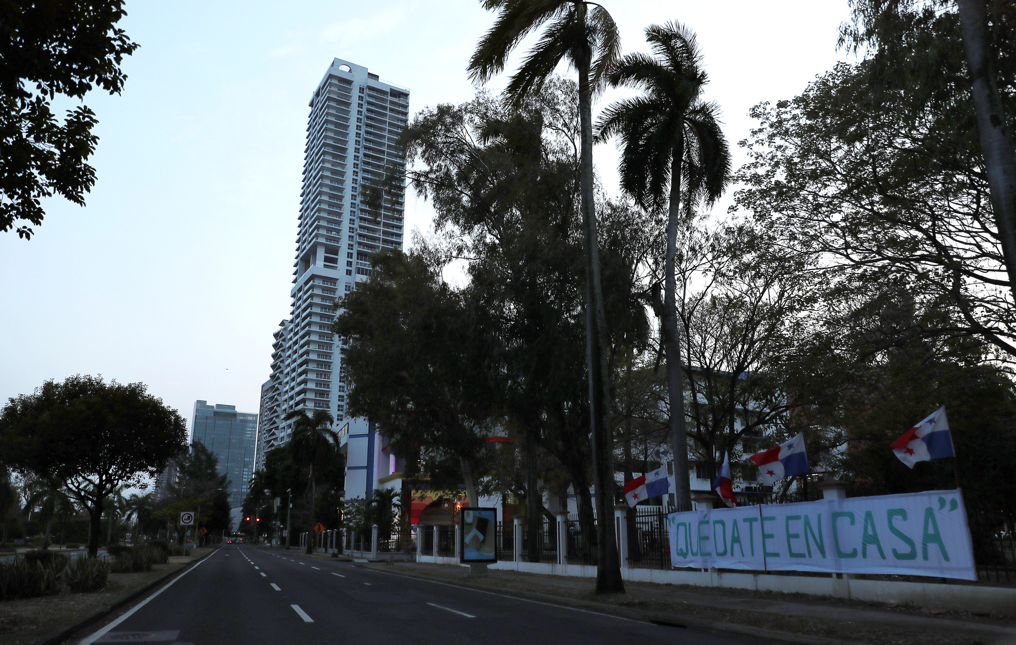 A banner reading "Stay at Home" is pictured near an empty avenue during the curfew as the coronavirus disease (COVID-19) outbreak continues, in Panama City, Panama March 31, 2020. REUTERS