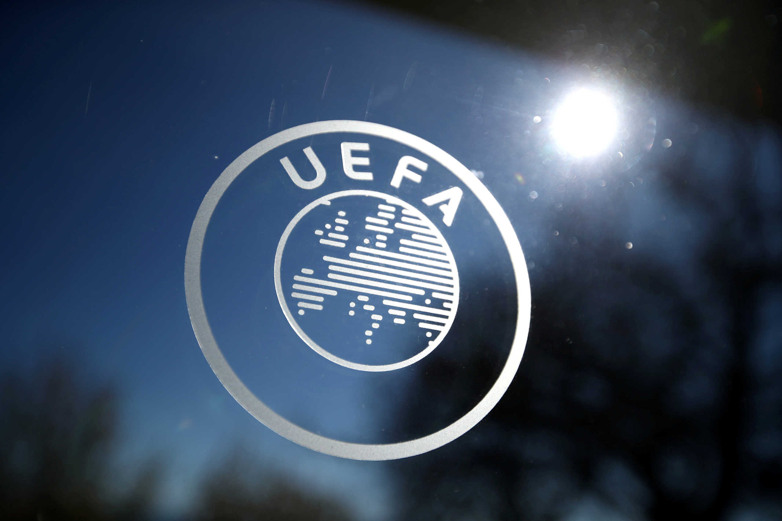 FILE PHOTO: Soccer Football - Europa League - Round of 16 draw - Nyon, Switzerland - February 28, 2020   General view of the UEFA logo at UEFA Headquarters before the draw   REUTERS