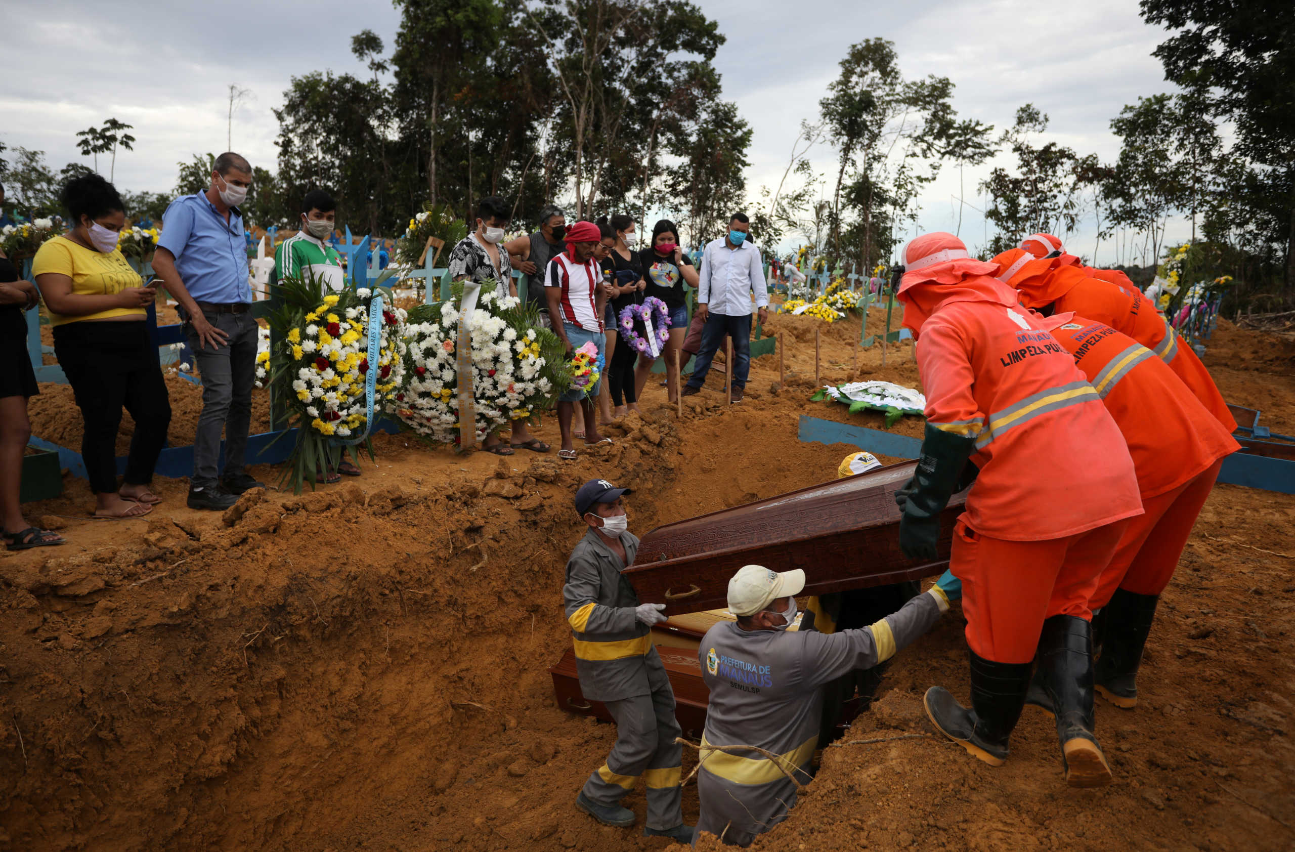 A collective burial of people that have passed away due to the coronavirus disease (COVID-19), is seen at the Parque Taruma cemetery in Manaus, Brazil April 23, 2020. REUTERS