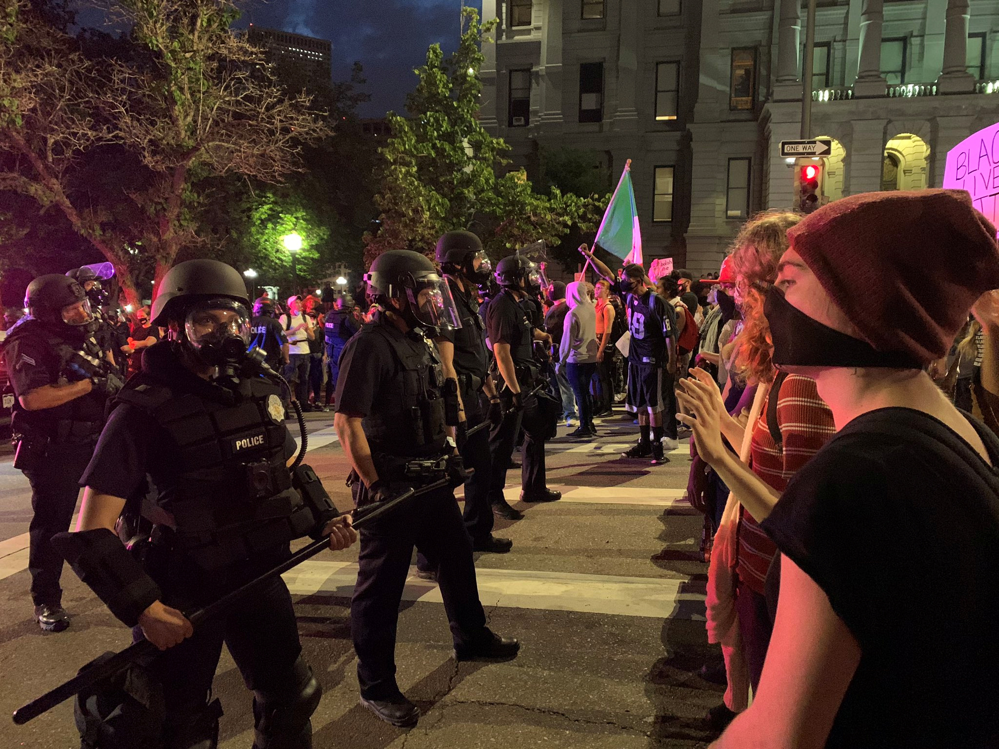 Demonstrators face off with police in riot gear near the Capitol building, to protest Monday's killing of African-American man George Floyd in Minneapolis by a white police officer, in Denver, Colorado, U.S., May 28, 2020 in this image obtained from social media. Picture taken May 28, 2020. Courtesy of Madison Lauterbach