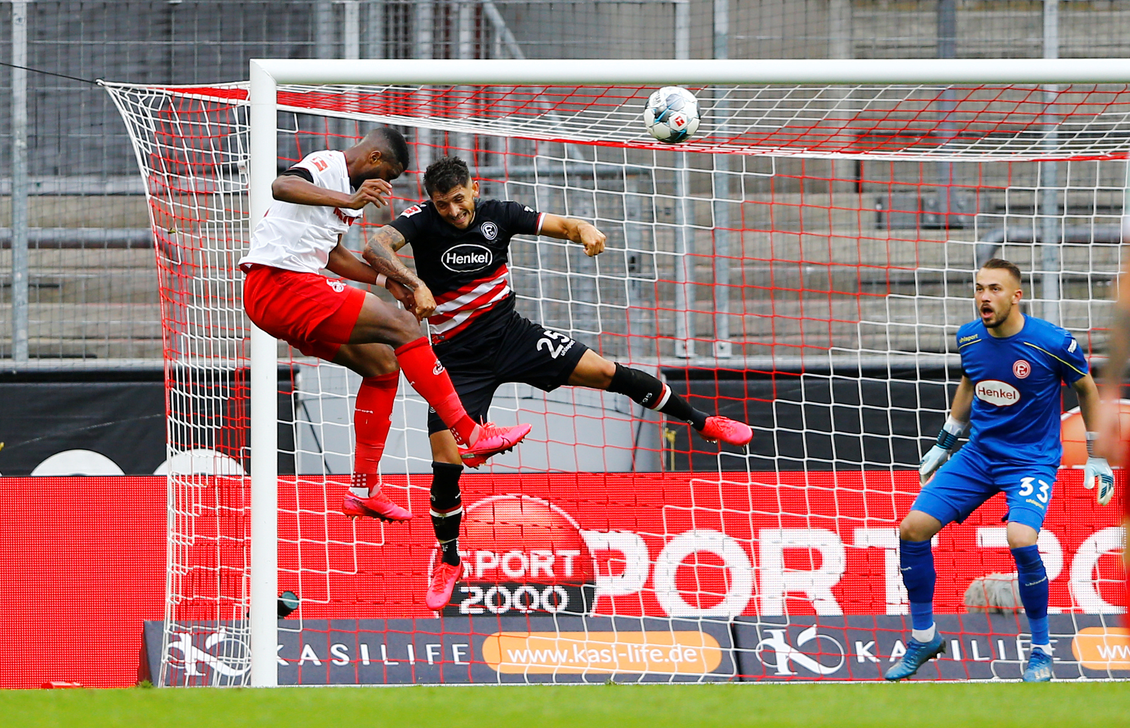 Soccer Football - Bundesliga - FC Cologne v Fortuna Dusseldorf - RheinEnergieStadion, Cologne, Germany - May 24, 2020   FC Cologne's Anthony Modeste scores their first goal, as play resumes behind closed doors following the outbreak of the coronavirus disease (COVID-19)  REUTERS