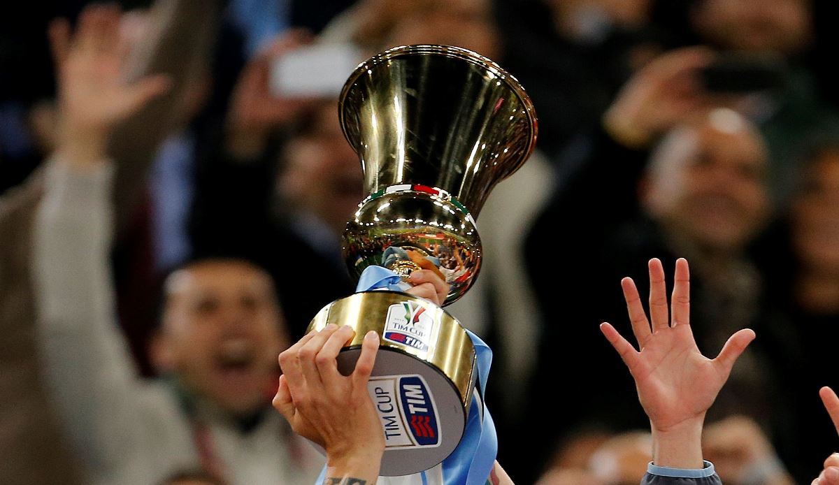 FILE PHOTO: ON THIS DAY -- May 3  May 3, 2014     SOCCER - Napoli's Marek Hamsik holds aloft the Coppa Italia trophy as he celebrates with his team mates after they beat Fiorentina at the Stadio Olimpico in Rome.     Lorenzo Insigne scored twice in the first half before Dries Mertens added a third as Napoli won 3-1 despite going down to 10 men when Gokhan Inler was sent off after the break.     It was the fifth time Napoli had won the Cup and the second time they lifted the trophy in three years after beating Juventus in the 2012 final. REUTERS