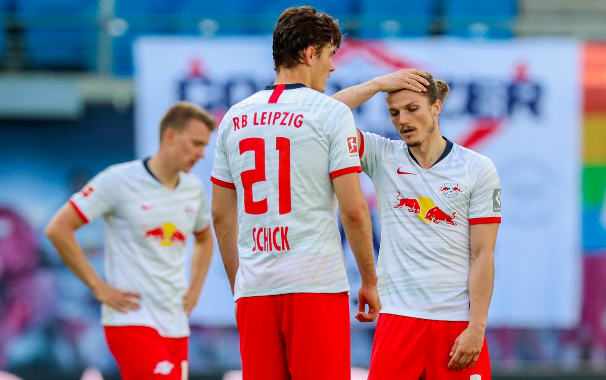 Soccer Football - Bundesliga - RB Leipzig v SC Freiburg - Red Bull Arena, Leipzig, Germany - May 16, 2020 RB Leipzig's Marcel Sabitzer and Patrik Schick react, as play resumes behind closed doors following the outbreak of the coronavirus disease (COVID-19) Jan Woitas