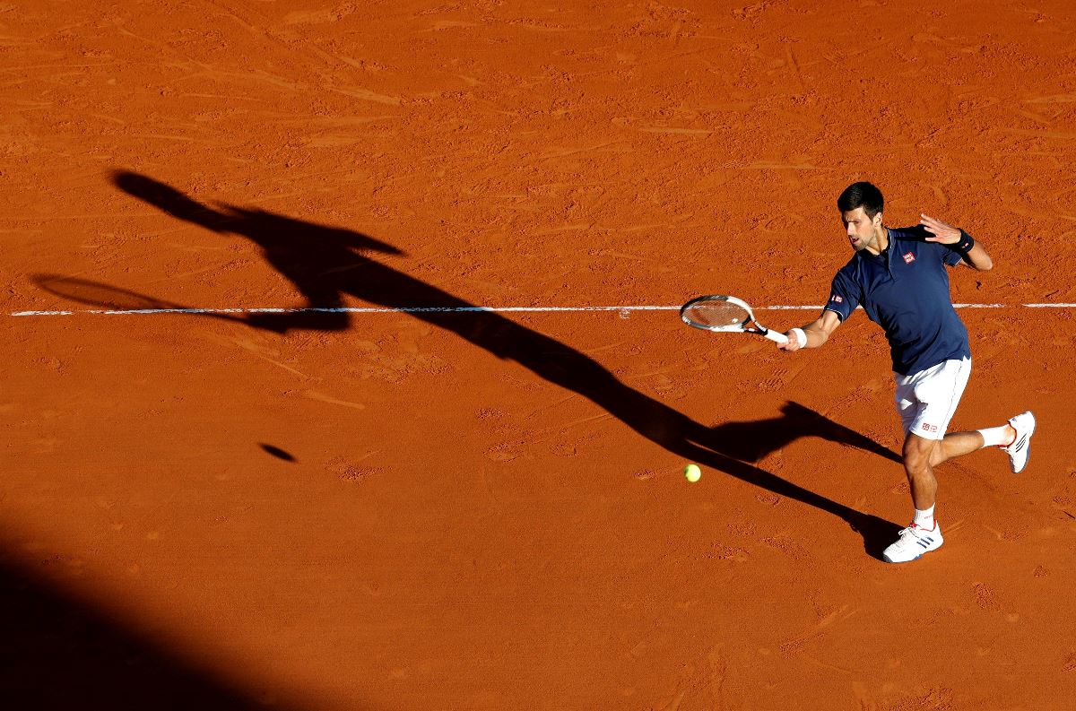 FILE PHOTO: ON THIS DAY Ð APRIL 20  April 20, 2017     TENNIS - Serbia's second seed Novak Djokovic plays a shot to Pablo Carreno Busta during his three-set victory over the Spaniard in the third round of the Monte Carlo Masters.     Djokovic was knocked out in the quarter-finals by Belgian David Goffin, leading to a split with his coach and fitness team in a bid to rediscover his winning touch.     The year 2017 proved to be a disappointing one for Djokovic, who won only two ATP 250 titles before he withdrew from tournaments in the latter part of the season to recover from an elbow injury. REUTERS