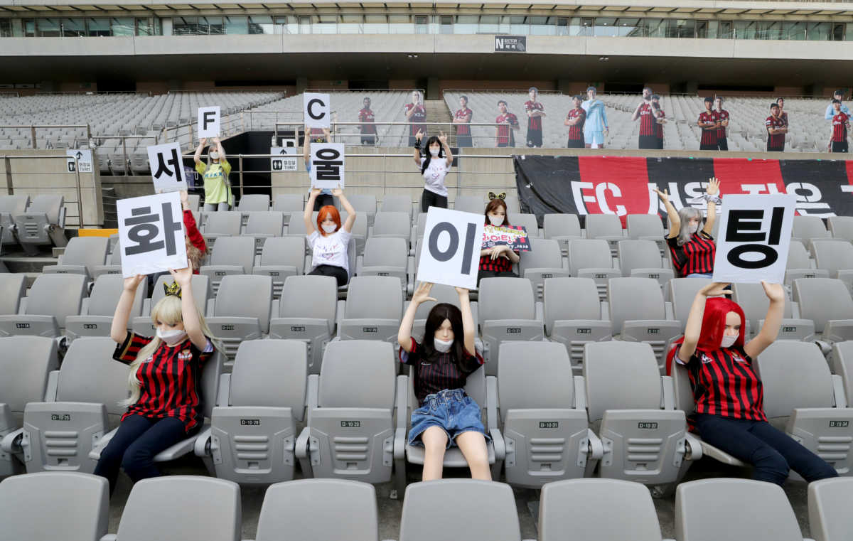 Mannequins are placed in spectator seats to cheer South Korea's football club FC Seoul team during a match against Gwangju FC, which is held without fans due to the coronavirus disease (COVID-19) outbreak, in Seoul, South Korea, May 17, 2020. Picture taken May 17, 2020. Yonhap