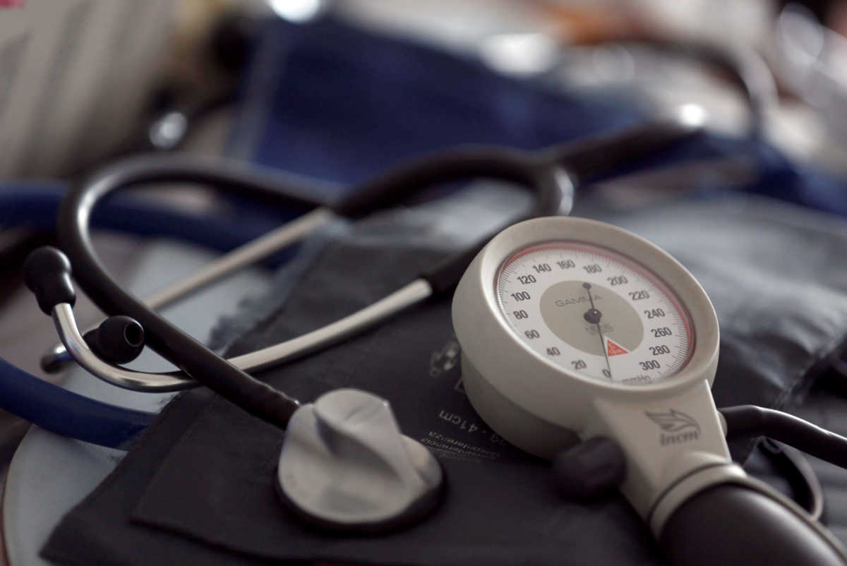 FILE PHOTO: A photo illustration shows a stethoscope and  blood-pressure machine of a French general practitioner displayed in a doctor's office in Bordeaux January 7, 2015. REUTERS