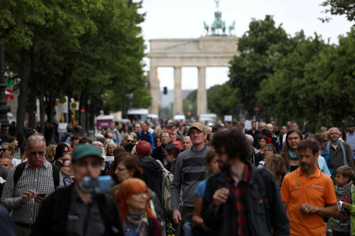FILE PHOTO: People attend a protest against the government's restrictions following the coronavirus disease (COVID-19) outbreak, in Berlin, Germany, May 23, 2020. REUTERS