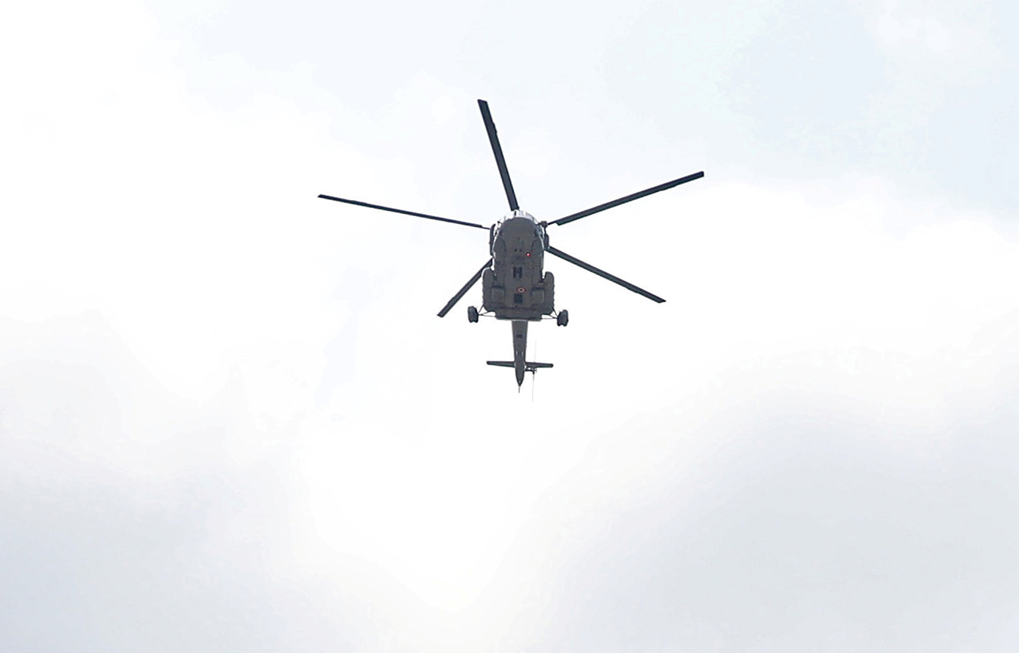 Indian Air Force (IAF) M1-17 helicopter drops flower petals over a hospital as part of an activity being carried out by the IAF to show gratitude towards the frontline warriors fighting the coronavirus disease (COVID-19) outbreak, in Kolkata, India, May 3, 2020. REUTERS