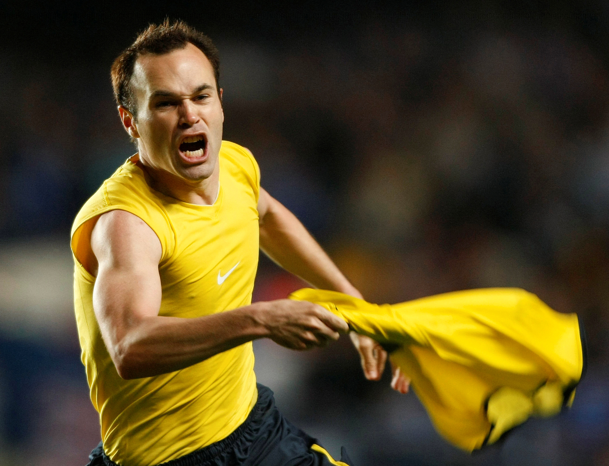 FILE PHOTO: Barcelona's Andres Iniesta celebrates a goal against Chelsea  during their Champions League semi-final second leg soccer match at Stamford Bridge in London May 6, 2009. REUTERS