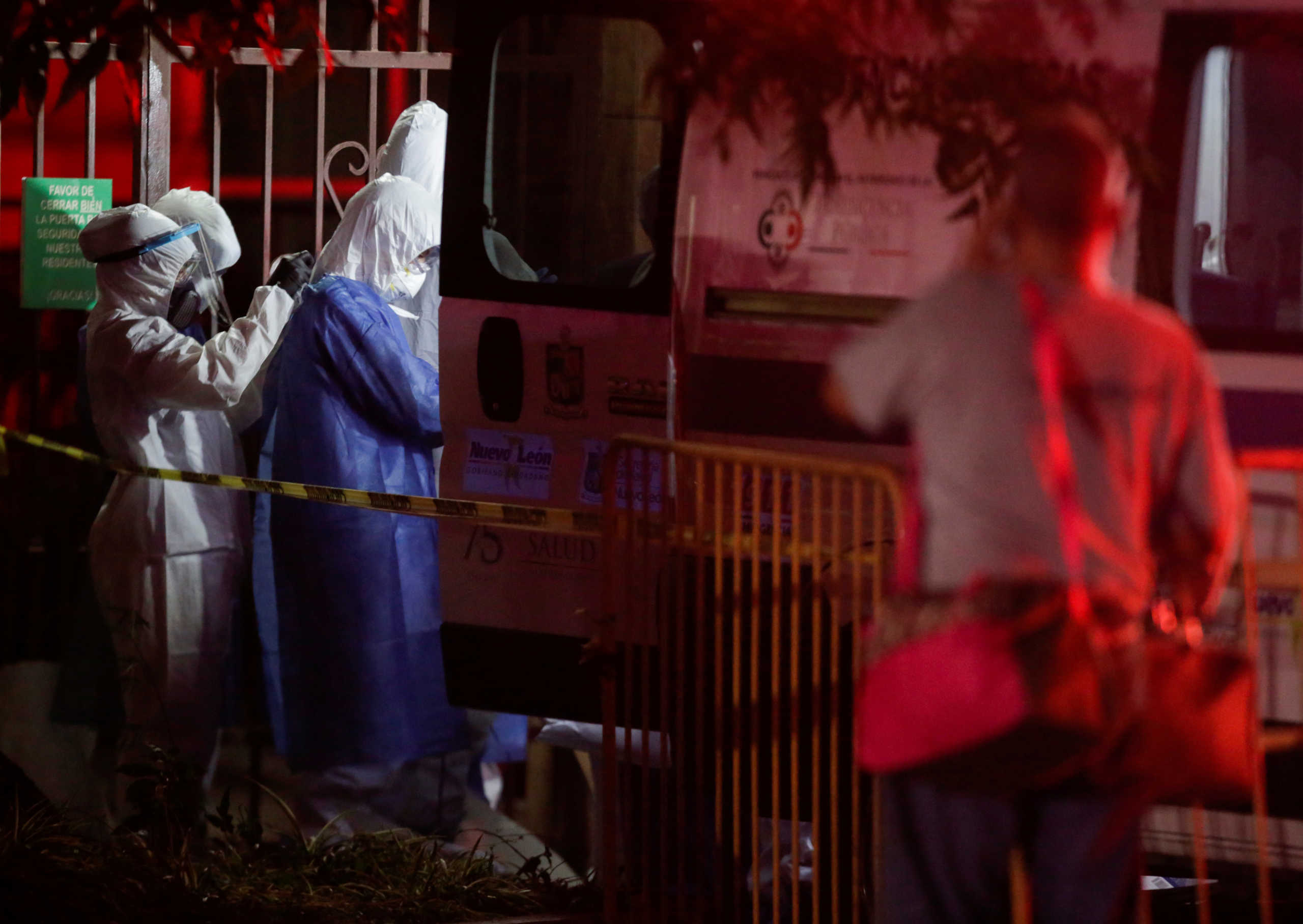 Healthcare workers prepare to enter the nursing house "Retirement House Luis Elizondo", where people have been infected by the coronavirus disease (COVID-19) according to local media, in Guadalupe, on the outskirts of Monterrey, Mexico May 6, 2020. REUTERS