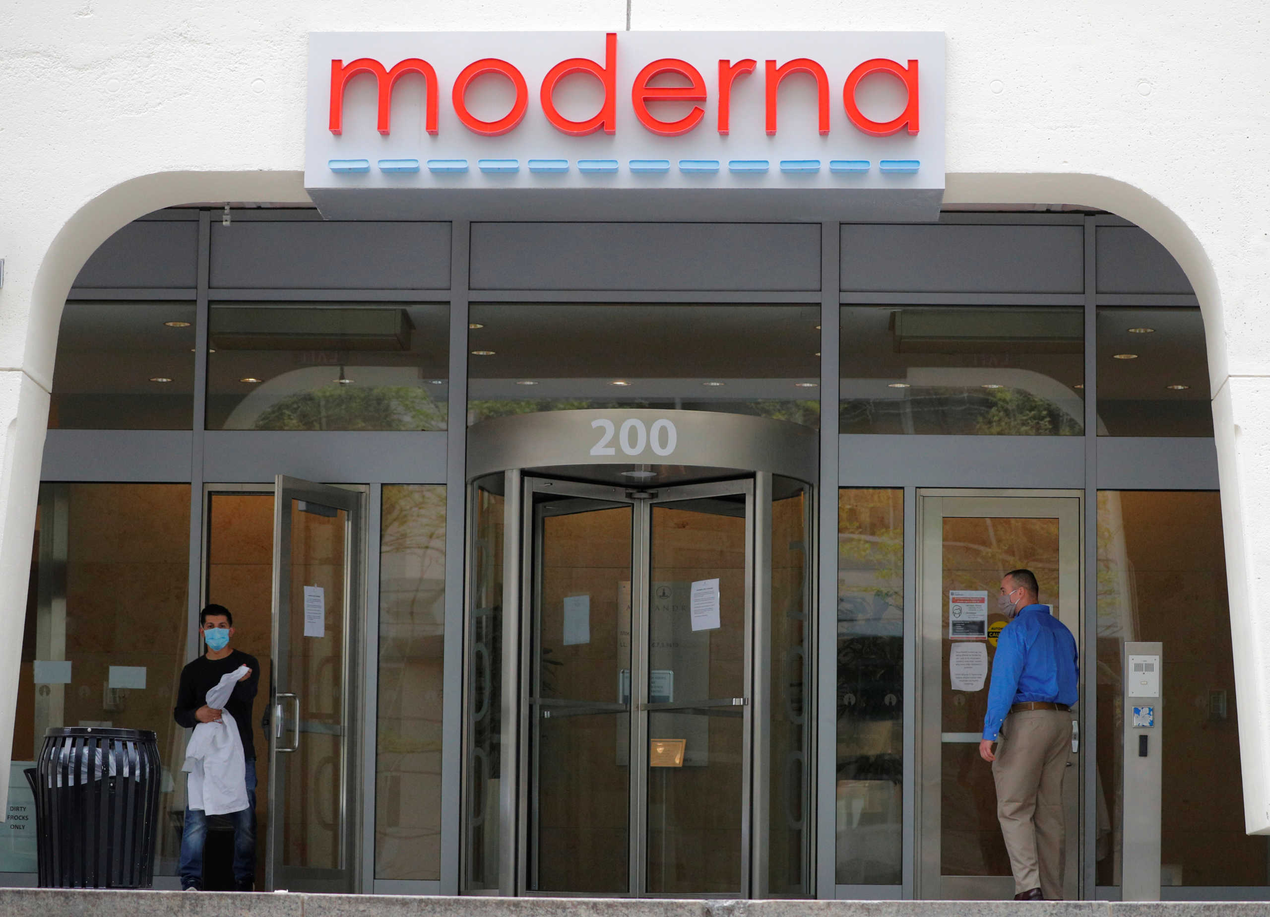 A sign marks the headquarters of Moderna Therapeutics, which is developing a vaccine against the coronavirus disease (COVID-19), in Cambridge, Massachusetts, U.S., May 18, 2020.   REUTERS