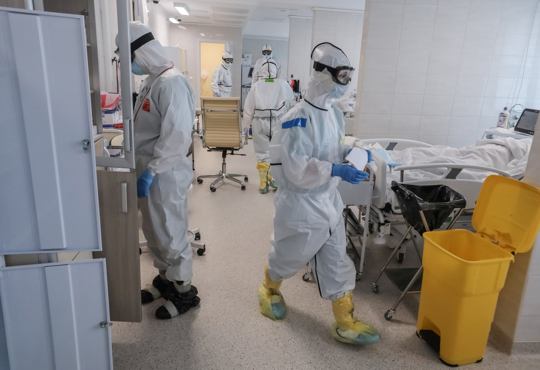 Medical specialists wearing personal protective equipment (PPE) work in the Intensive Care Unit (ICU) for coronavirus disease (COVID-19) patients at a hospital in Moscow, Russia, in this handout picture released on May 3, 2020. Sofya Sandurskaya