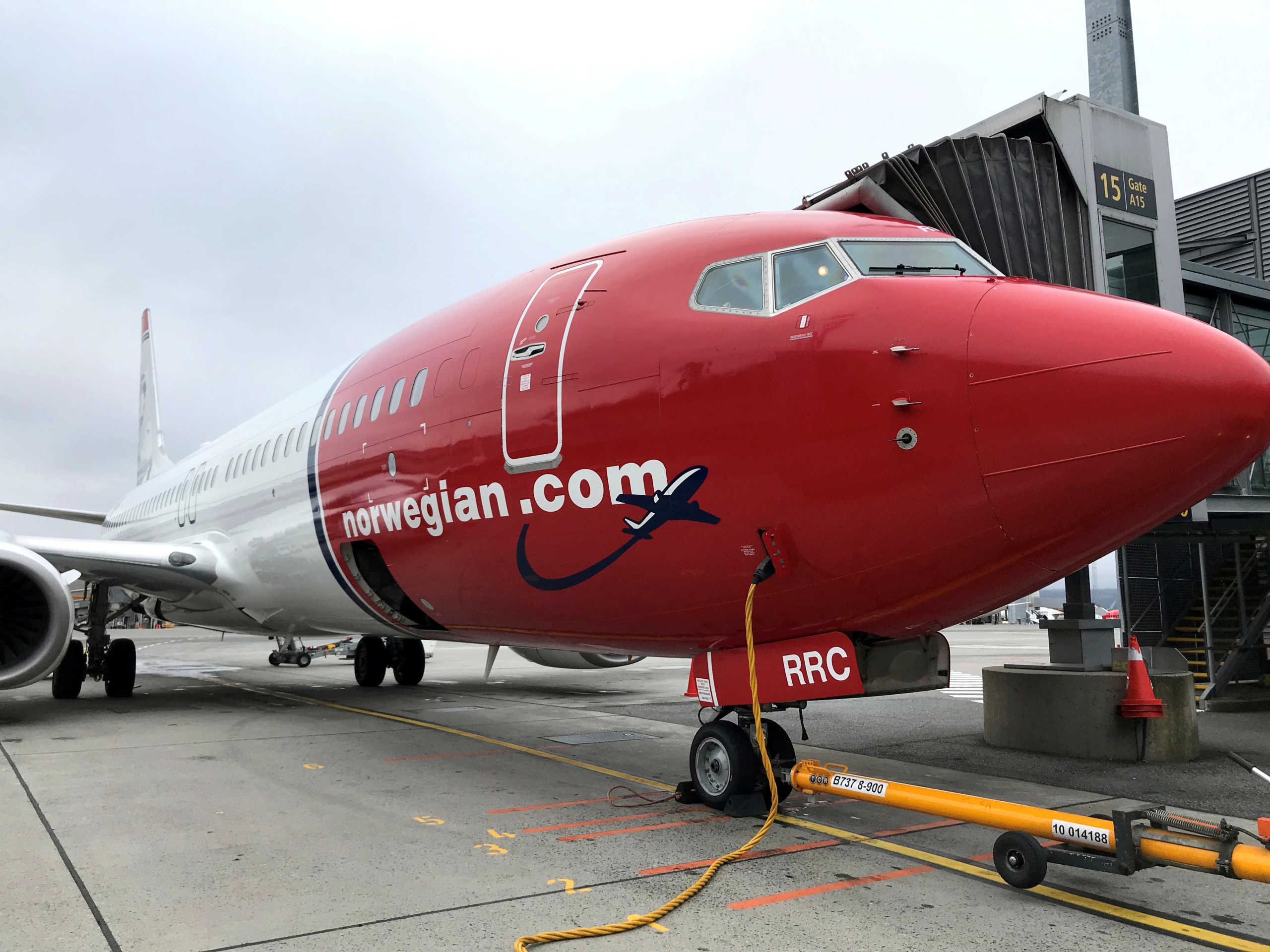 FILE PHOTO: A Norwegian Air plane is refuelled at Oslo Gardermoen airport, Norway November 7, 2019. REUTERS