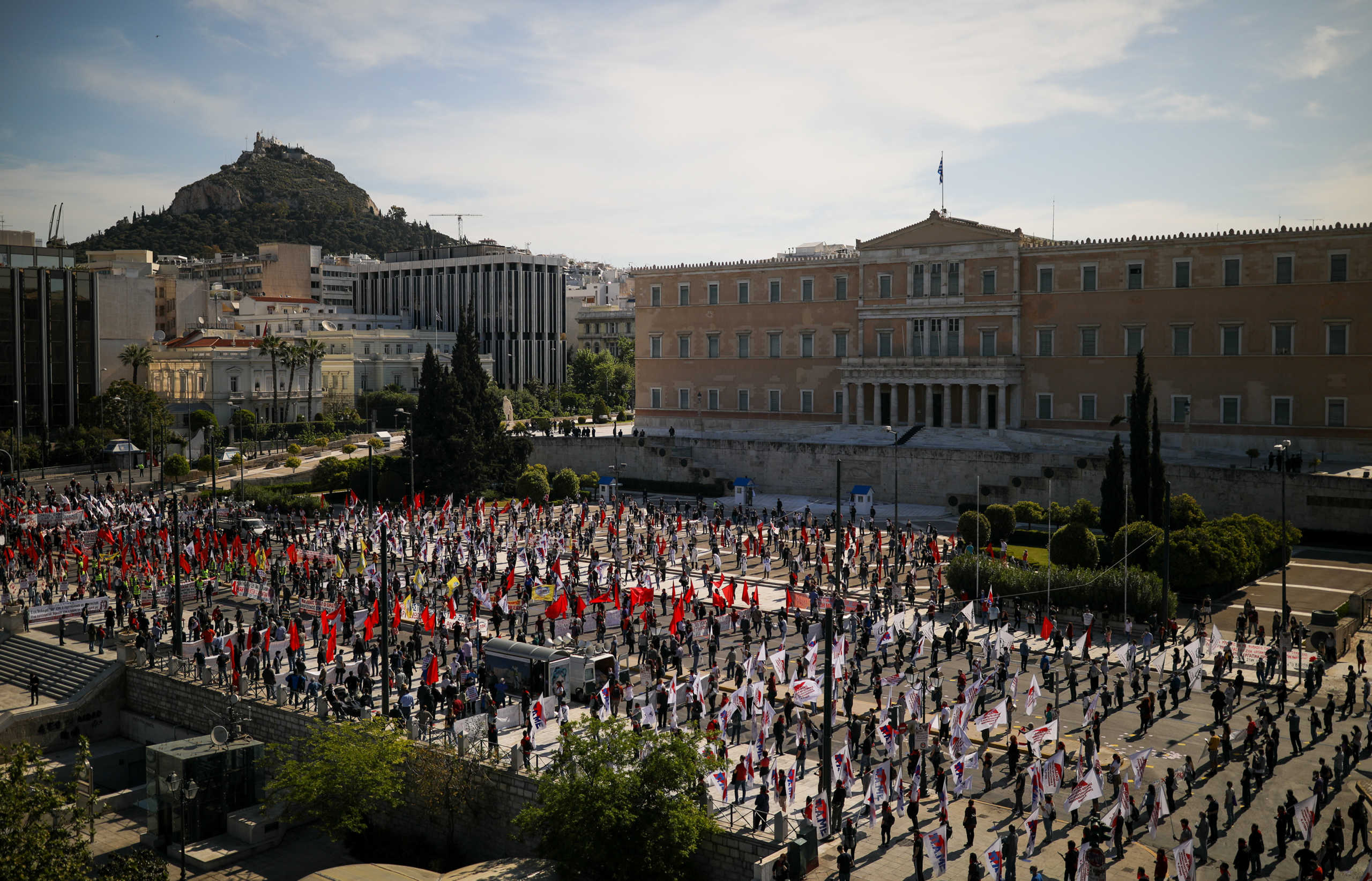 Members of the communist-affiliated trade union PAME practice social distancing during a rally commemorating May Day, following the coronavirus disease (COVID-19) outbreak, in Athens, Greece, May 1, 2020. REUTERS