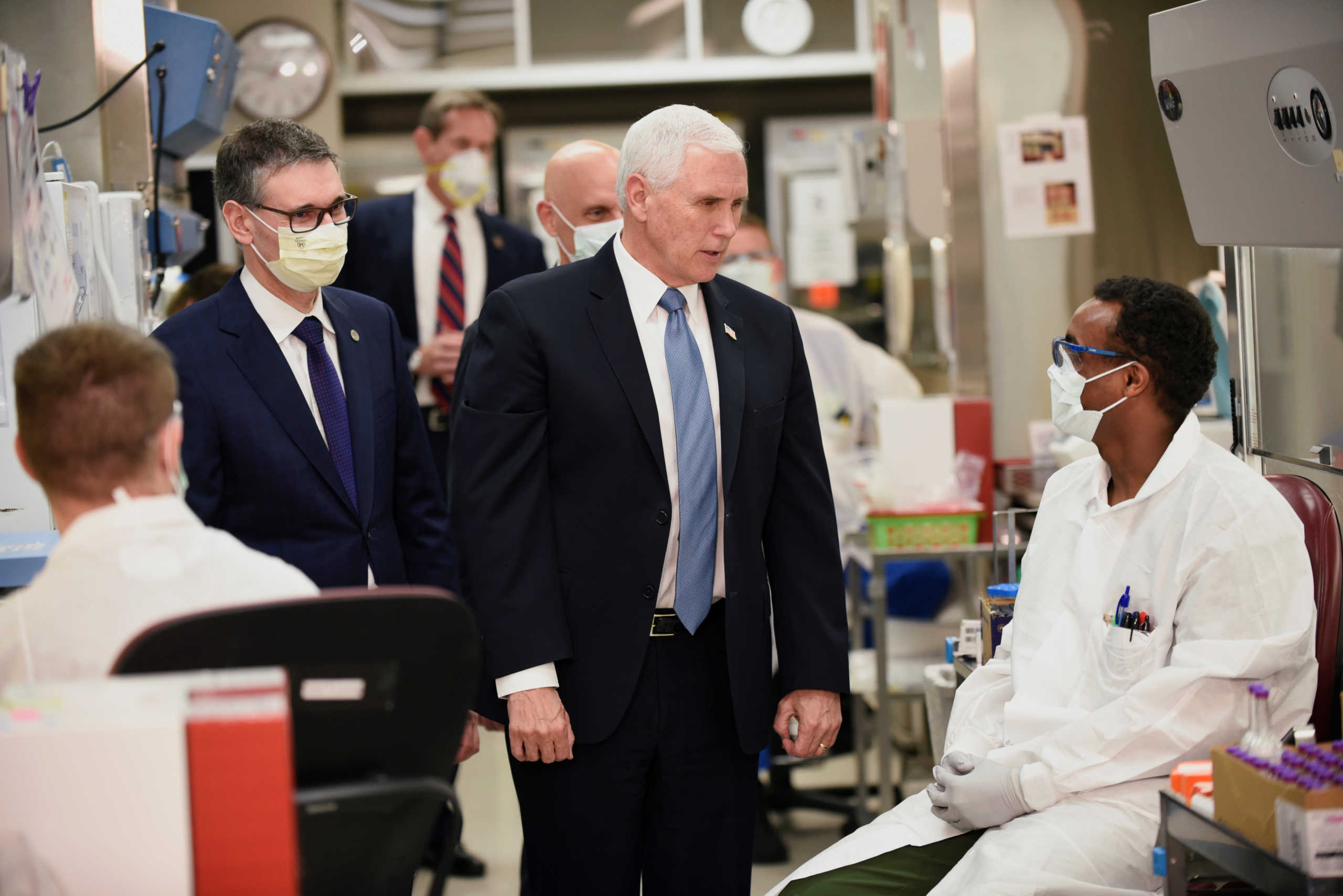 Vice President Mike Pence visits with lab physicians and techs while touring Mayo Clinic facilities supporting coronavirus disease (COVID-19) research and treatment in Rochester, Minnesota, U.S., April 28, 2020. REUTERS