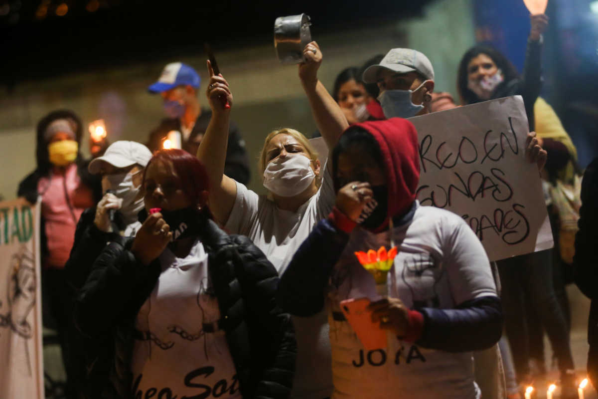 Relatives of prisoners take part in a protest in front of La Picota prison against overcrowding in the country's prisons, amid the outbreak of the coronavirus disease (COVID-19) in Bogota, Colombia May 12, 2020. REUTERS