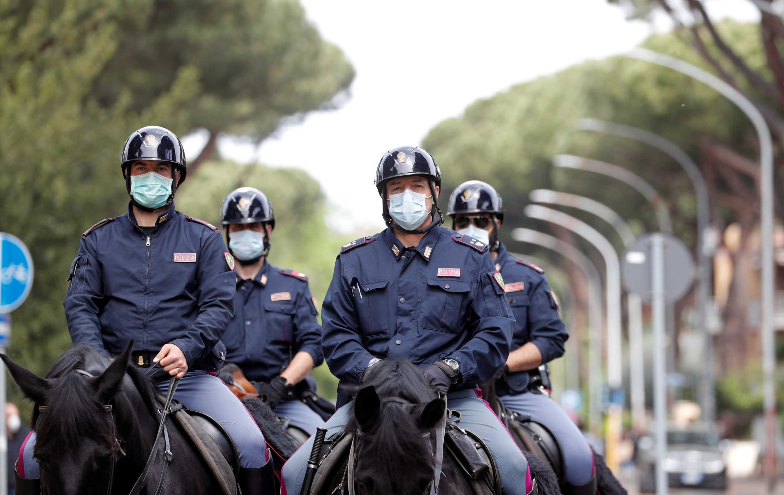 Italian police officers on horses patrol at the Parco degli Acquedotti park, as the spread of the coronavirus disease (COVID-19) continues, in Rome, Italy, May 1, 2020. REUTERS