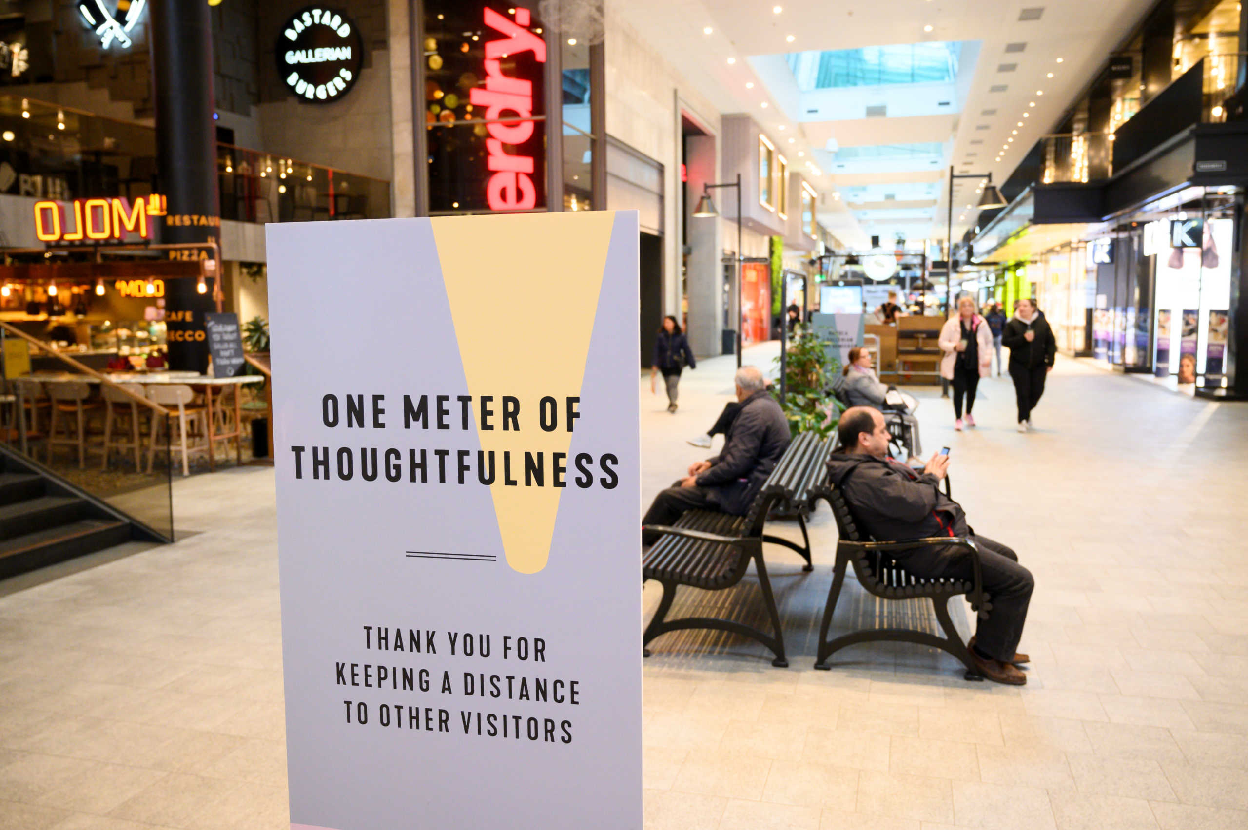 A sign promoting social distancing is pictured in the Gallerian shopping center, as the spread of the coronavirus disease (COVID-19) continues, in Stockholm, Sweden, May 12, 2020. TT News Agency
