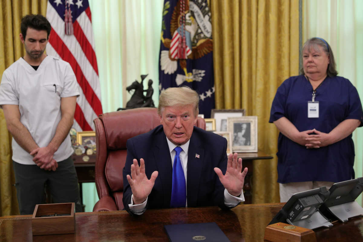 U.S. President Donald Trump speaks during an event in honor of National Nurses Day in the Oval Office at the White House in Washington, U.S., May 6, 2020. REUTERS
