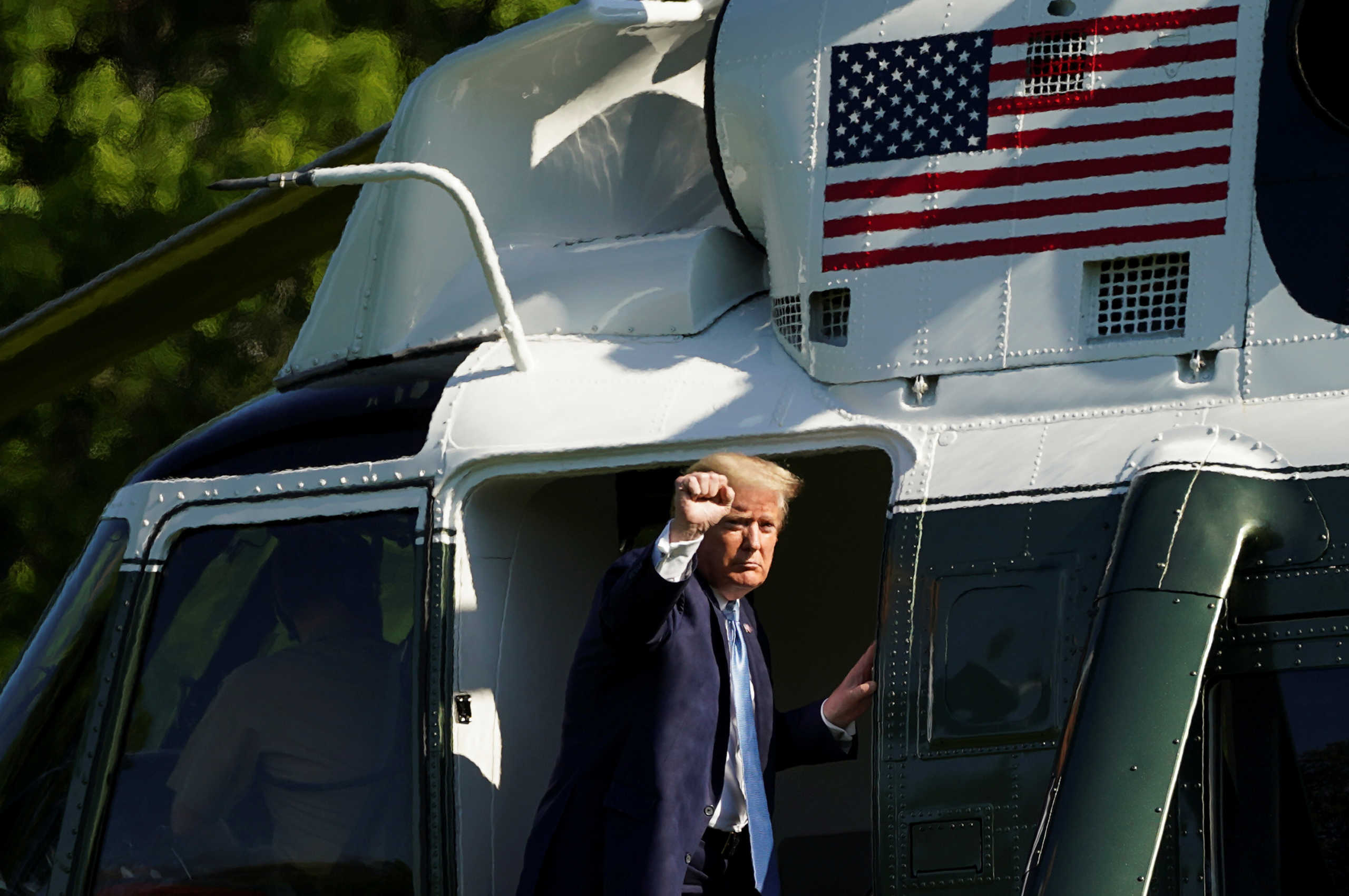 U.S. President Donald Trump bpards the Marine One helicopter as he departs for the Camp David presidential retreat from the South Lawn of the White House in Washington, U.S., May 15, 2020. REUTERS