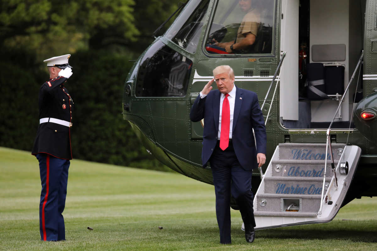 U.S. President Donald Trump returns to the White House after travel to Michigan during the coronavirus disease (COVID-19) outbreak in Washington, U.S. May 21, 2020. REUTERS