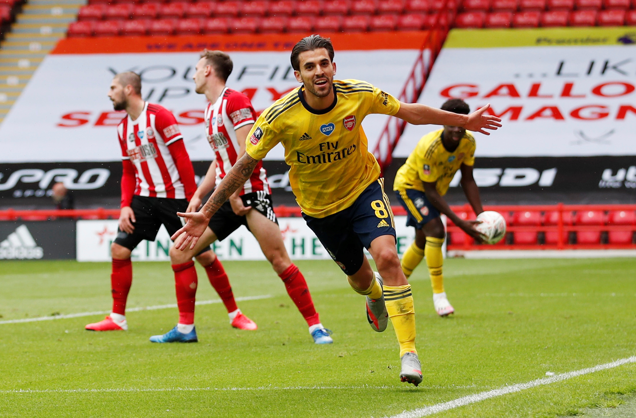 Soccer Football -  FA Cup - Quarter Final - Sheffield United v Arsenal - Bramall Lane, Sheffield, Britain - June 28, 2020 Arsenal's Dani Ceballos celebrates scoring their second goal, as play resumes behind closed doors following the outbreak of the coronavirus disease (COVID-19)  REUTERS