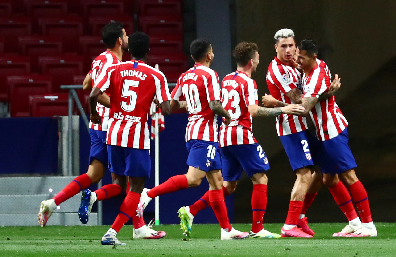 Soccer Football - La Liga Santander - Atletico Madrid v Real Valladolid - Wanda Metropolitano, Madrid, Spain - June 20, 2020  Atletico Madrid's Vitolo celebrates scoring their first goal with teammates, as play resumes behind closed doors following the outbreak of the coronavirus disease (COVID-19)   REUTERS