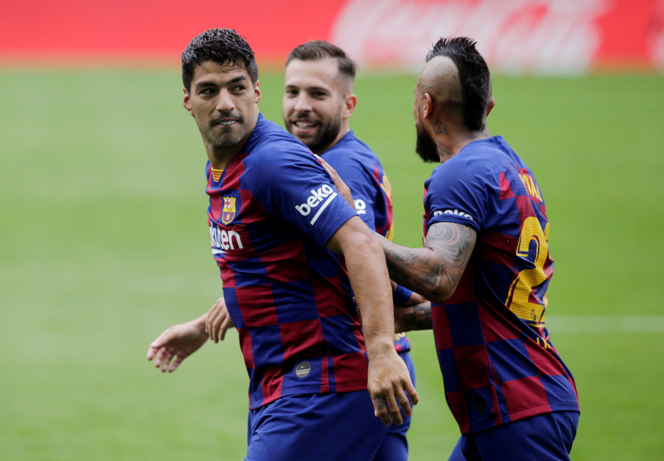 Soccer Football - La Liga Santander - Celta Vigo v FC Barcelona - Balaidos, Vigo, Spain - June 27, 2020   Barcelona's Luis Suarez celebrates scoring their first goal with teammates, as play resumes behind closed doors following the outbreak of the coronavirus disease (COVID-19)   REUTERS