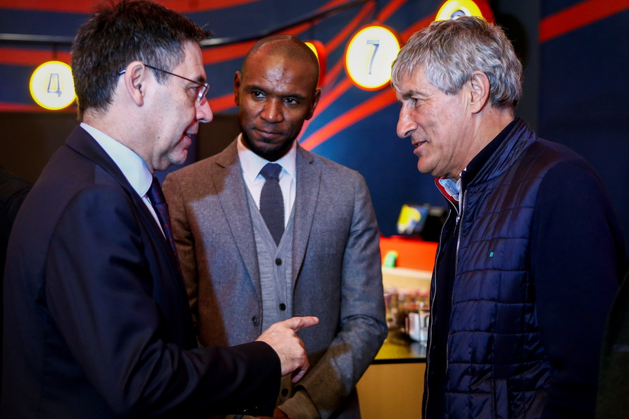 epa08233014 FC Barcelona President Josep Maria Bartomeu (L), sport director Eric Abidal (C) and head coach Quique Setien (R) during the opening of a Barca Store Canaletas in the Las Ramblas district in Barcelona, Spain, 20 February 2020.  EPA