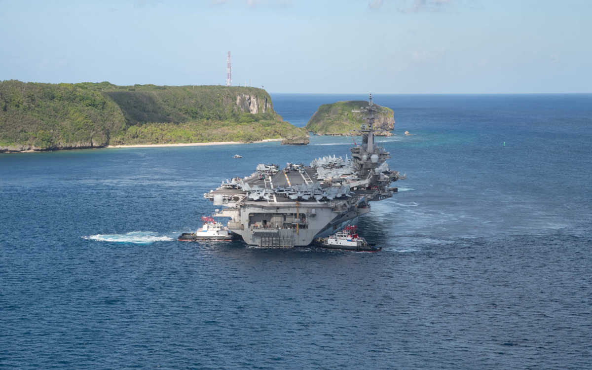 The U.S. Navy aircraft carrier USS Theodore Roosevelt departs following an extended visit in the midst of a coronavirus disease (COVID-19) outbreak, from Apra Harbor, Guam May 21, 2020. Picture taken May 21, 2020. U.S. Navy