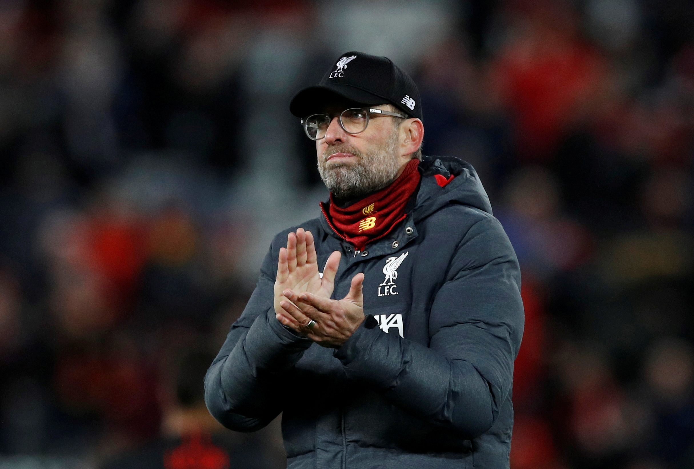 FILE PHOTO: Soccer Football - Champions League - Round of 16 Second Leg - Liverpool v Atletico Madrid - Anfield, Liverpool, Britain - March 11, 2020  Liverpool manager Juergen Klopp looks dejected as he applauds the fans after the match   REUTERS