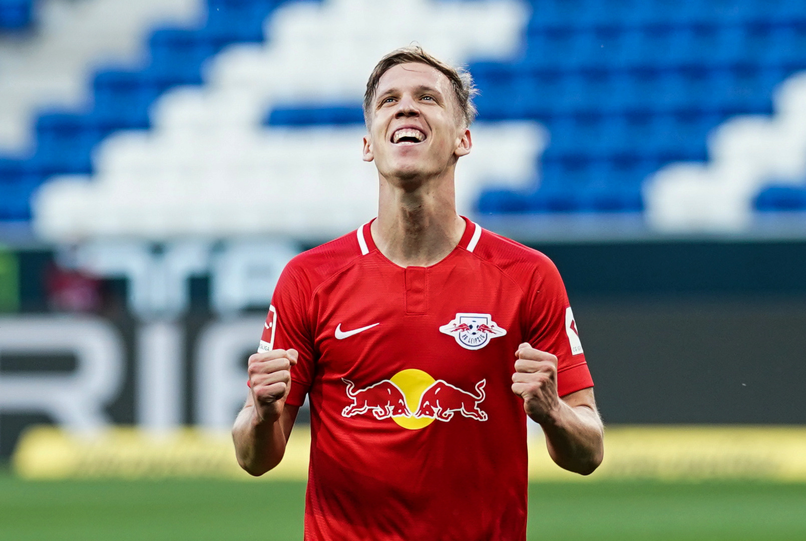 Soccer Football - Bundesliga - TSG 1899 Hoffenheim v RB Leipzig - PreZero Arena, Sinsheim, Germany - June 12, 2020 Leipzig's Dani Olmo celebrates scoring their second goal, as play resumes behind closed doors following the outbreak of the coronavirus disease (COVID-19) Uwe Anspach